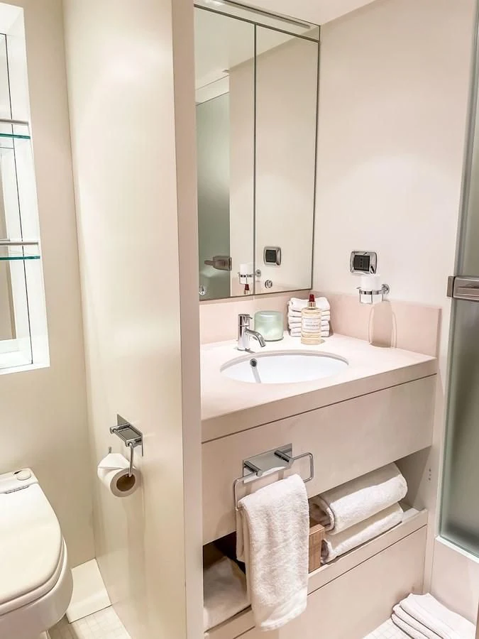 a bathroom with a sink and toilet aboard VERSE Yacht for Sale