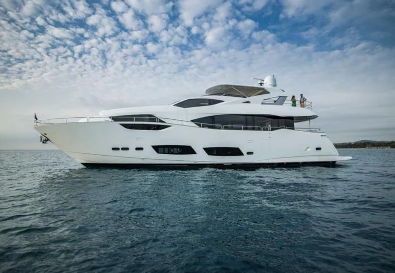 a white yacht on the water aboard AMOUR I Yacht for Sale