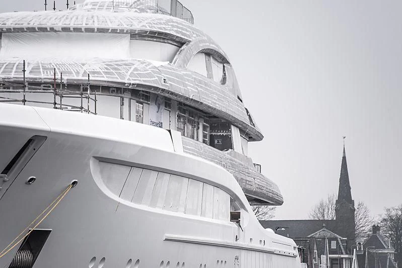 a building with a tower aboard PODIUM Yacht for Sale