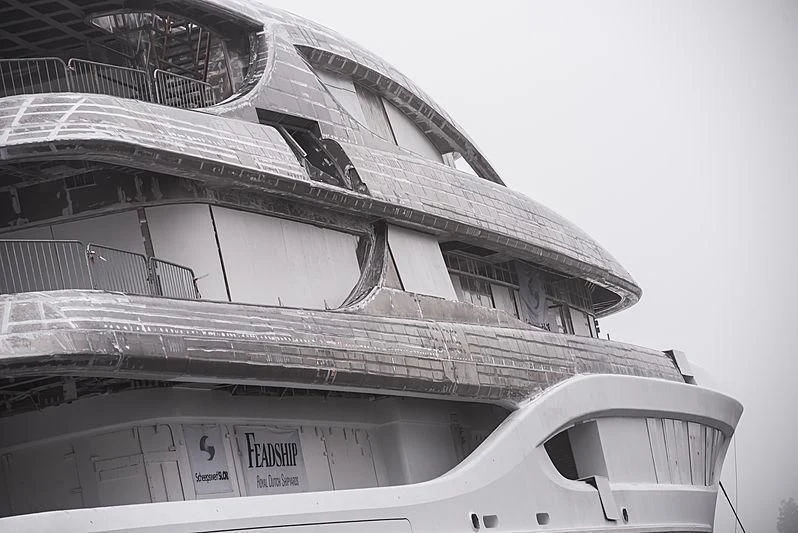 a building with a staircase aboard PODIUM Yacht for Sale