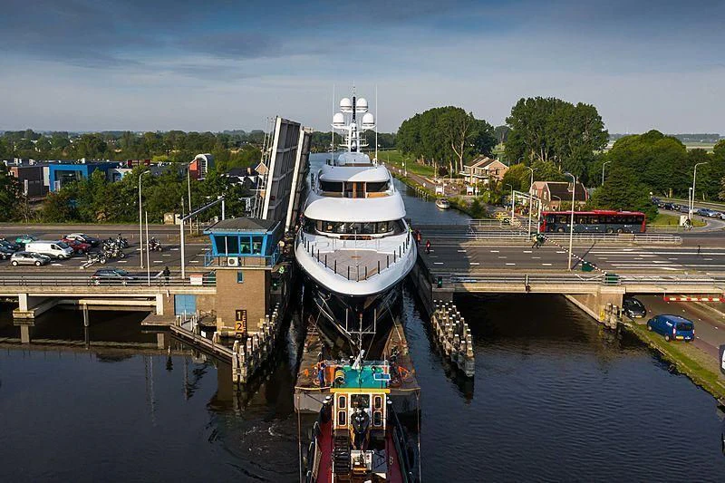 a boat docked at a dock aboard PODIUM Yacht for Sale