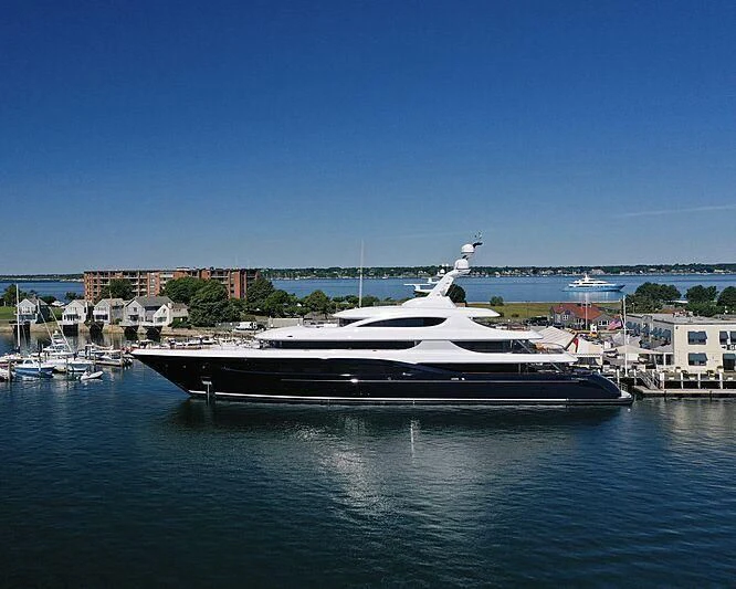 a large boat in the water aboard PODIUM Yacht for Sale