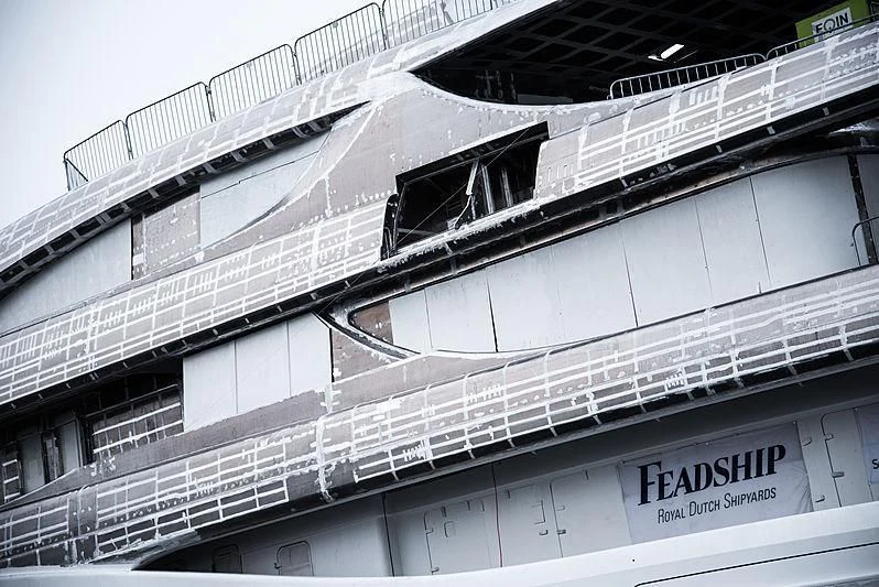 a building with a sign on the roof aboard PODIUM Yacht for Sale