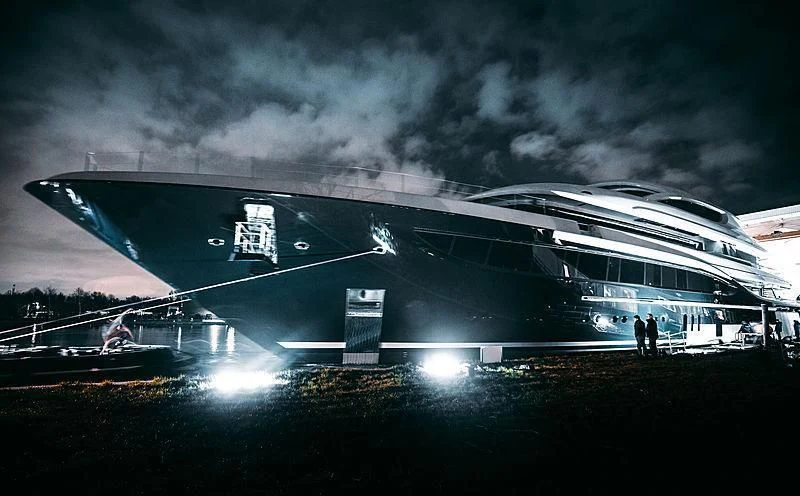 a building with a large body of water in front of it aboard PODIUM Yacht for Sale