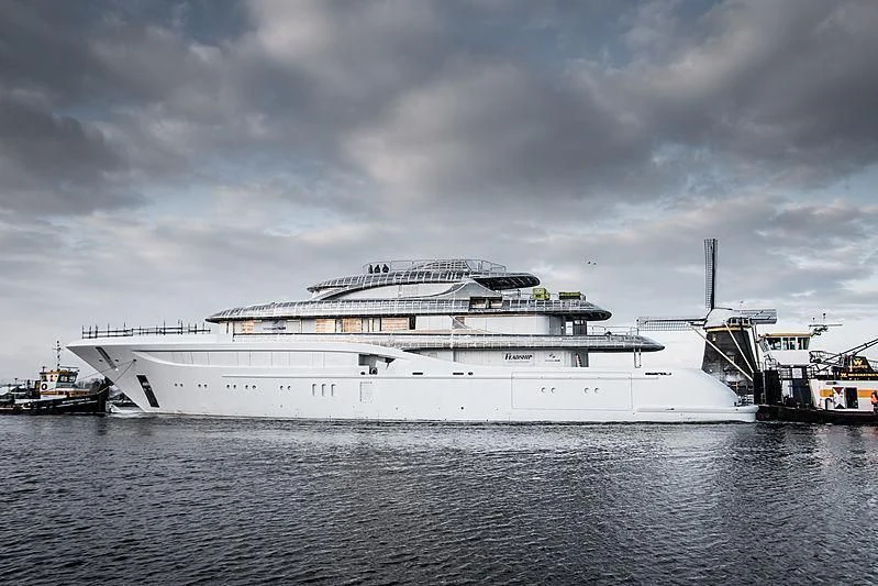 a large cruise ship in the water aboard PODIUM Yacht for Sale
