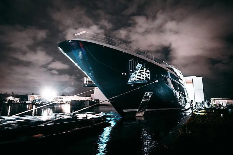 a large satellite dish on a dock aboard PODIUM Yacht for Sale
