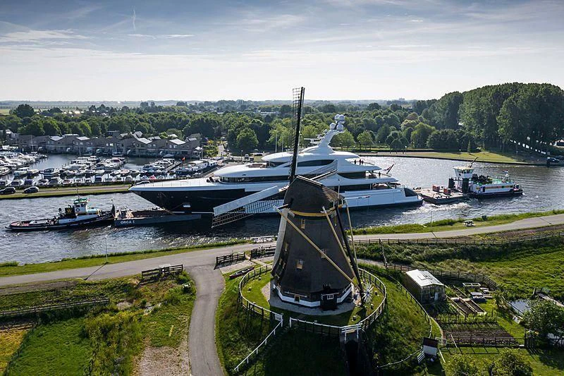 a helicopter on a rooftop aboard PODIUM Yacht for Sale