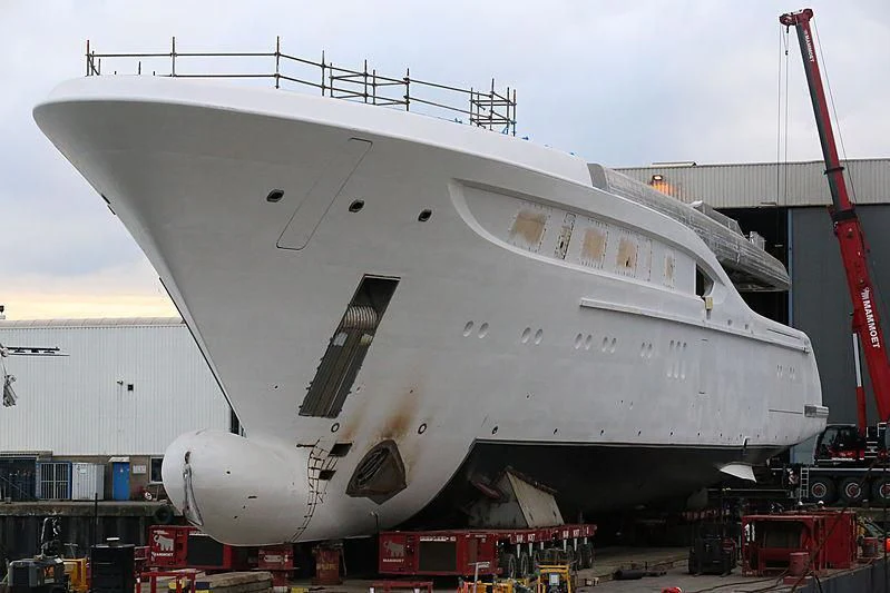 a large white ship aboard PODIUM Yacht for Sale