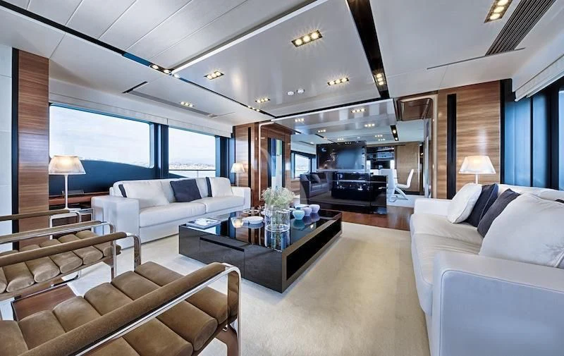 a living room with a large window aboard FUSION Yacht for Charter