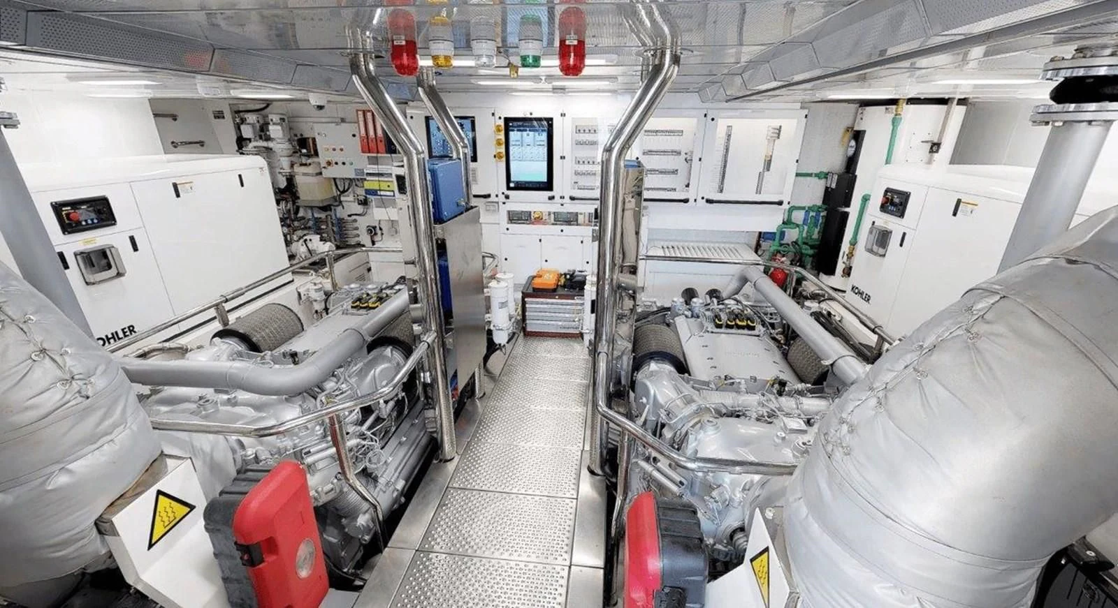 a room with a machine aboard FUSION Yacht for Charter