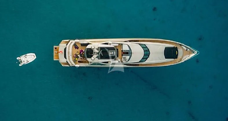 a white and black object on a blue surface aboard FUSION Yacht for Charter