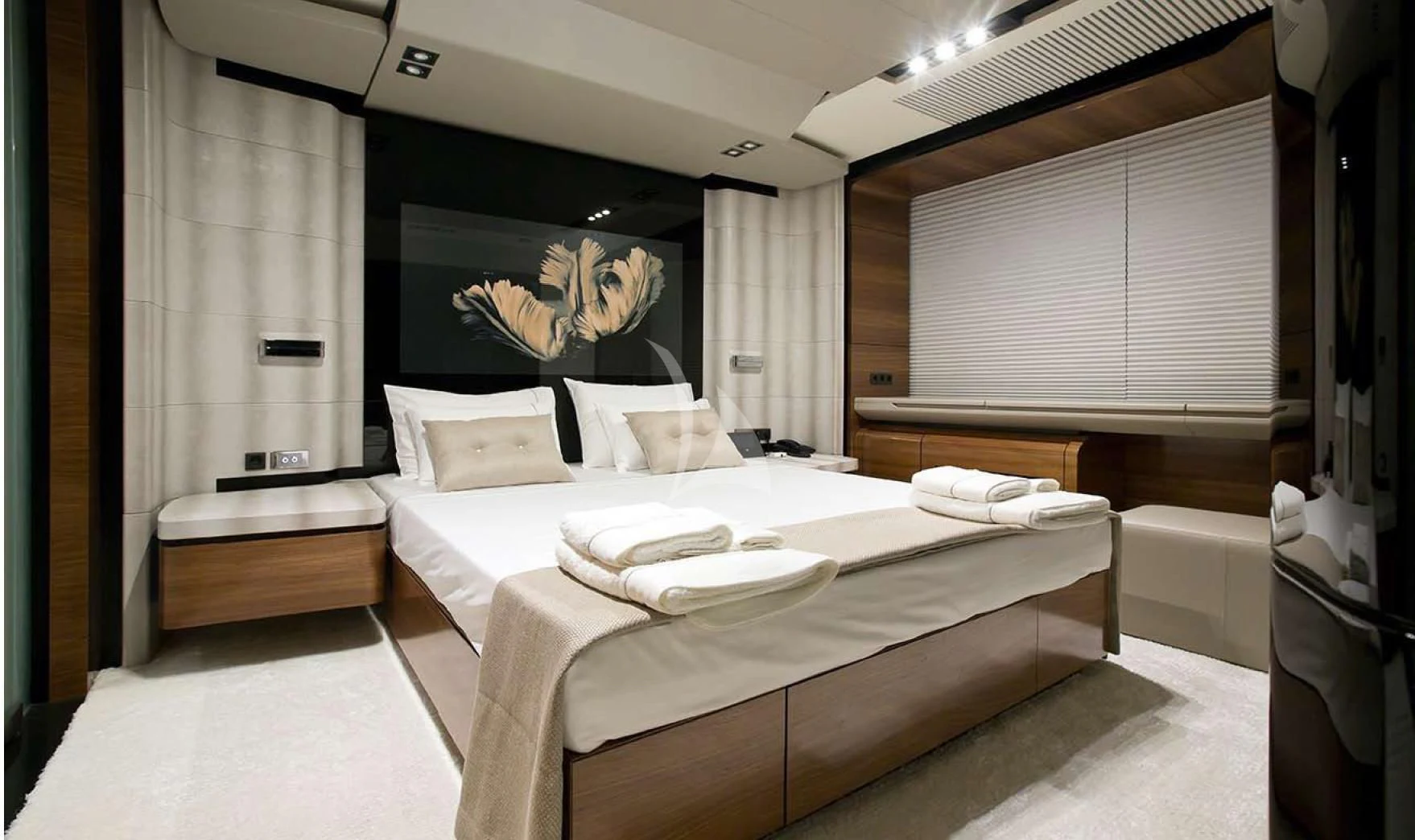 a room with two beds aboard FUSION Yacht for Charter