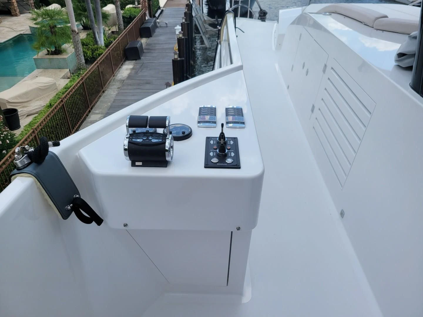 a black and white car on a white surface aboard GG Yacht for Sale