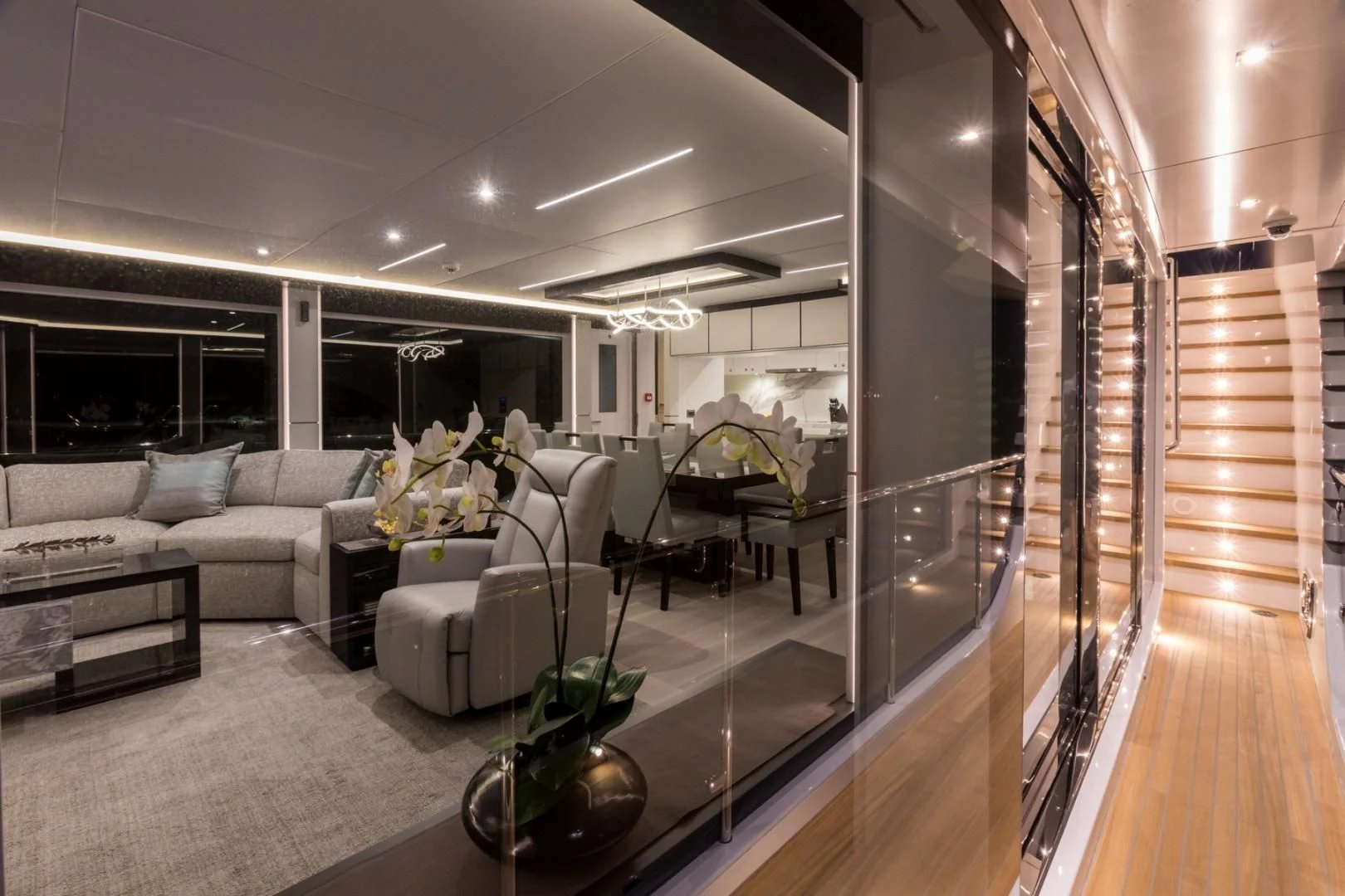 a living room with a wood floor aboard GG Yacht for Sale
