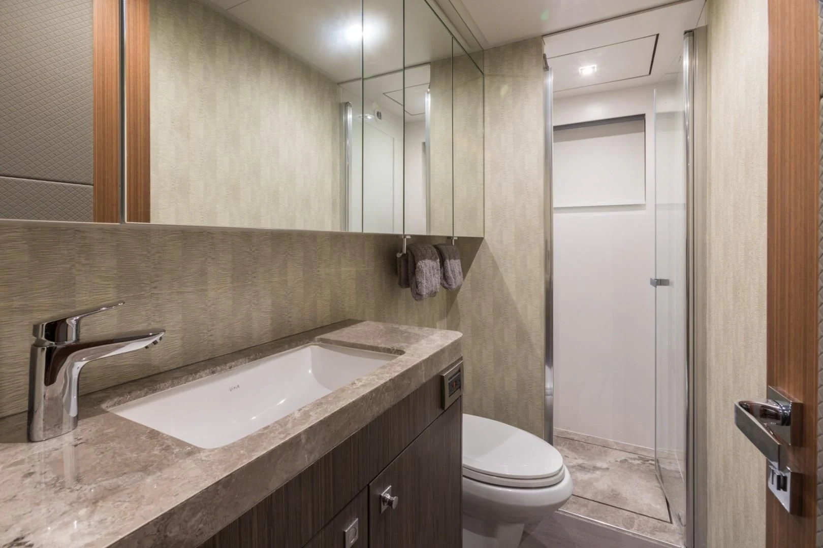 a bathroom with a sink and a toilet aboard GG Yacht for Sale