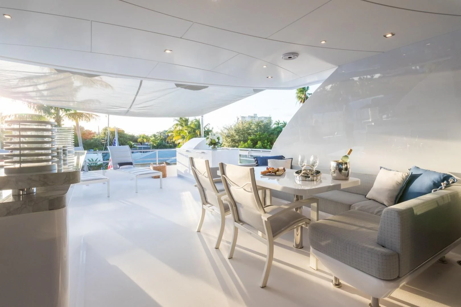 a room with a couch and a table aboard GG Yacht for Sale