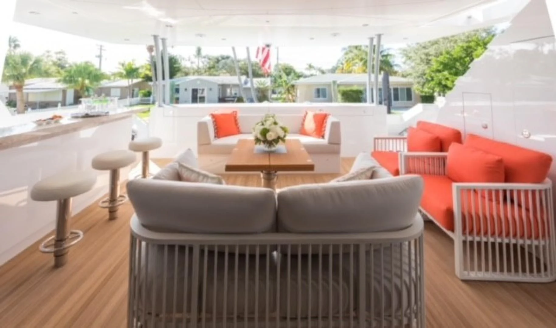 a room with couches and tables aboard GG Yacht for Sale