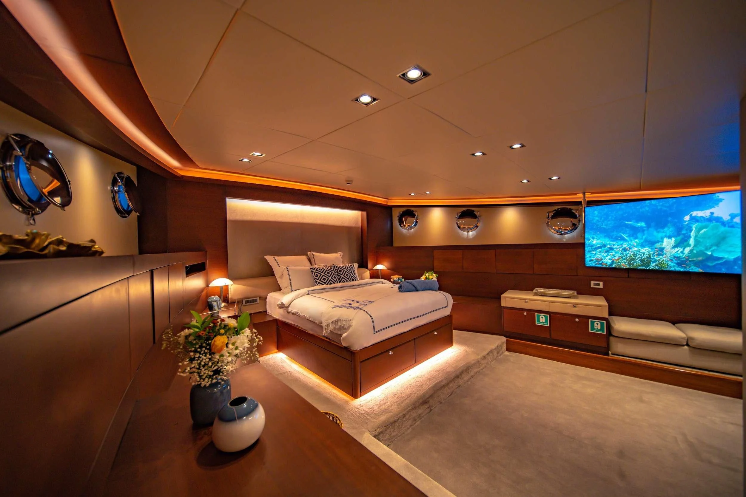 a room with a couch and a television aboard DOUBLE EAGLE Yacht for Sale