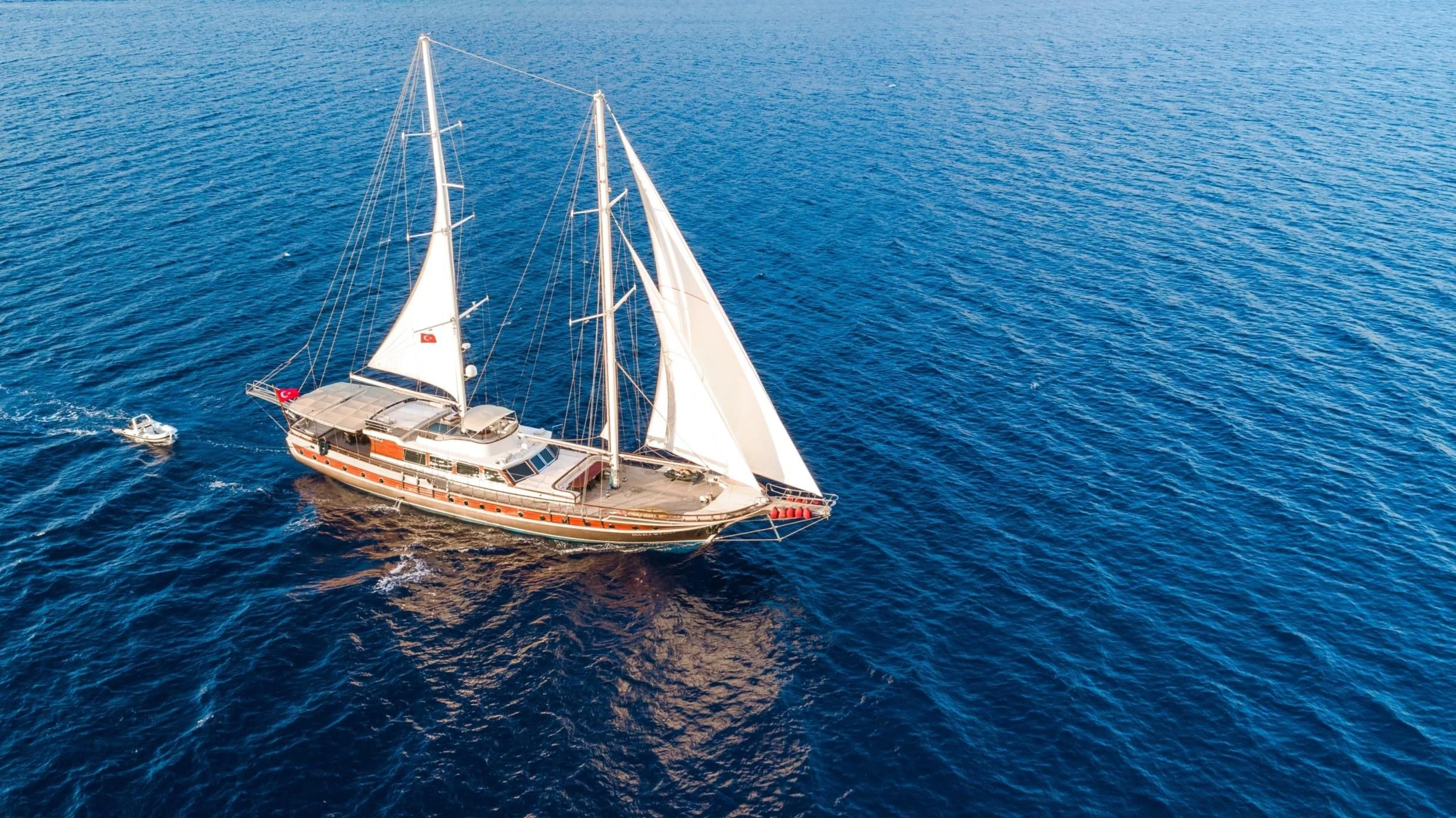 a sailboat on the water aboard DOUBLE EAGLE Yacht for Sale