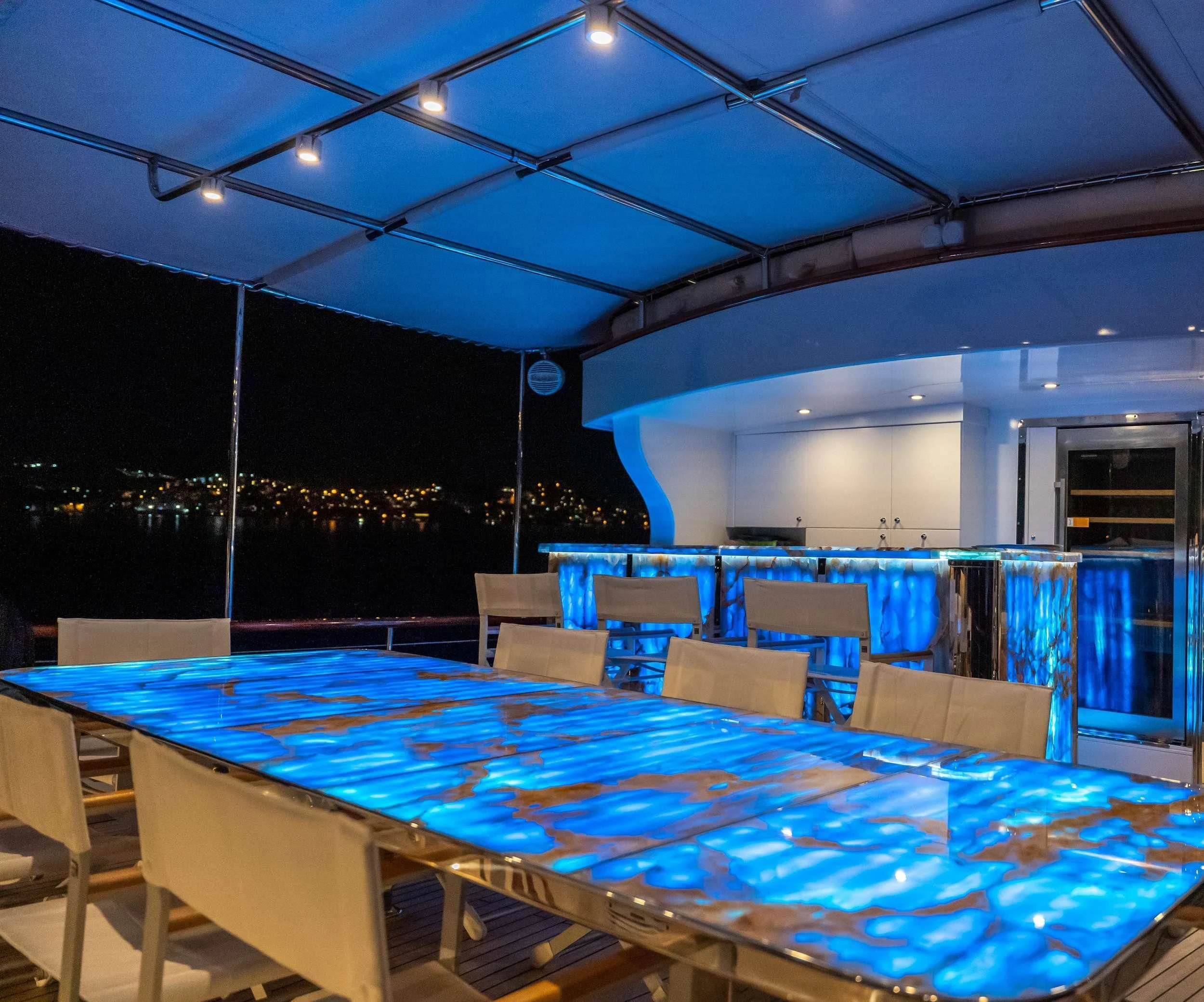 a large room with tables and chairs aboard DOUBLE EAGLE Yacht for Sale