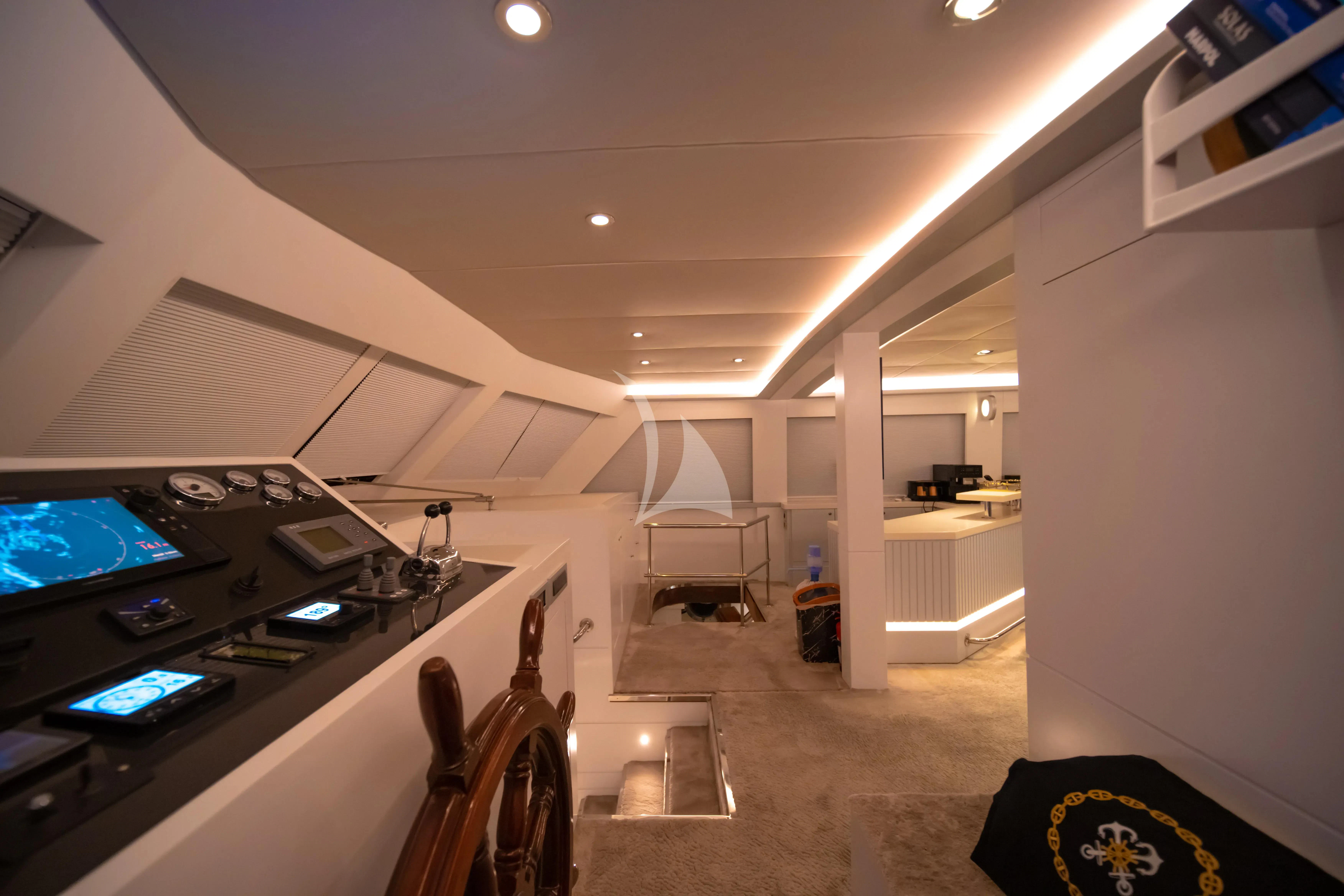 a room with a large desk and a television aboard DOUBLE EAGLE Yacht for Sale