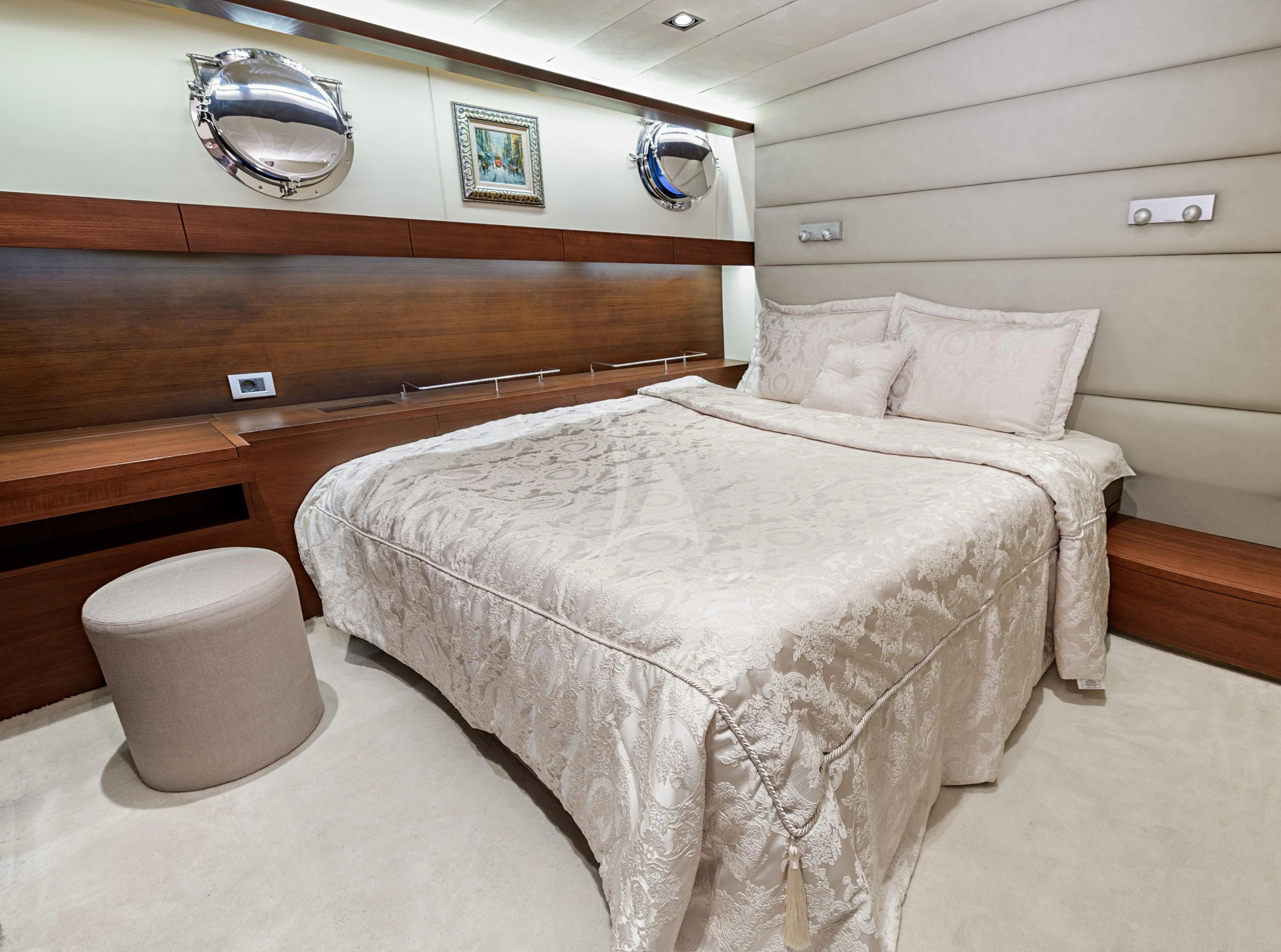 a bed with white sheets aboard DOUBLE EAGLE Yacht for Sale