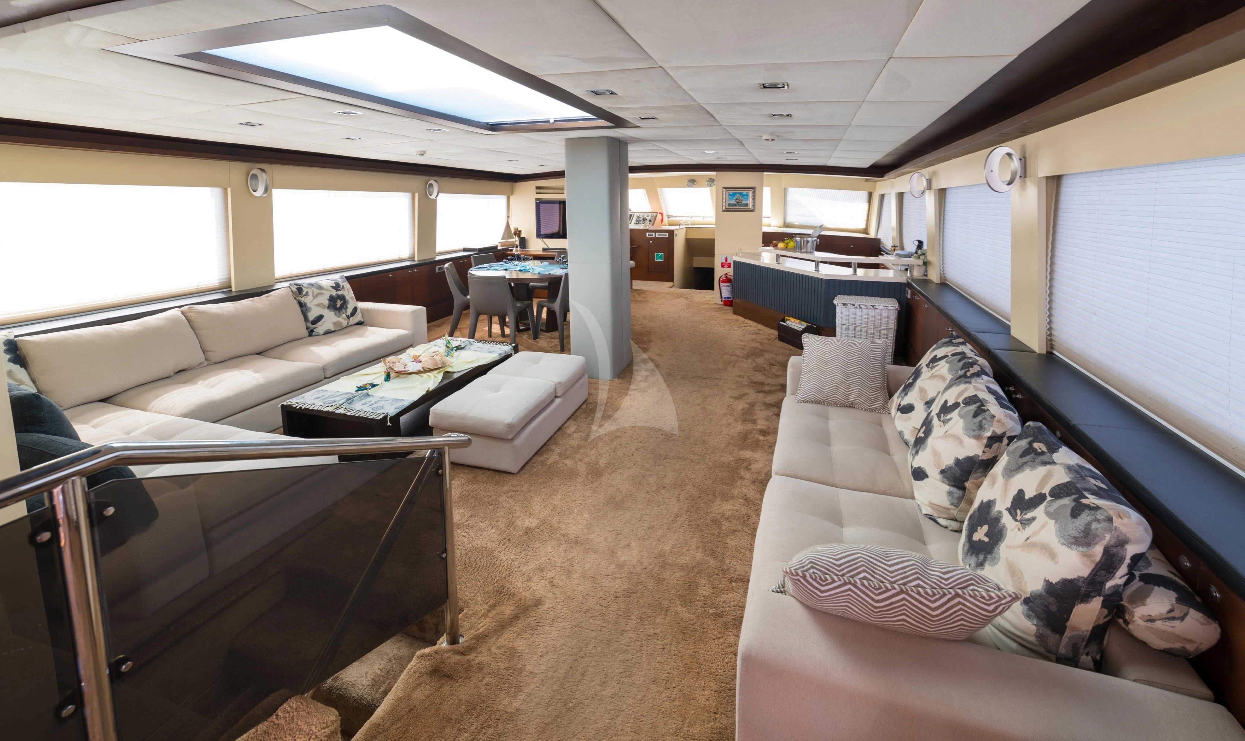 a room with a couch and a table aboard DOUBLE EAGLE Yacht for Sale