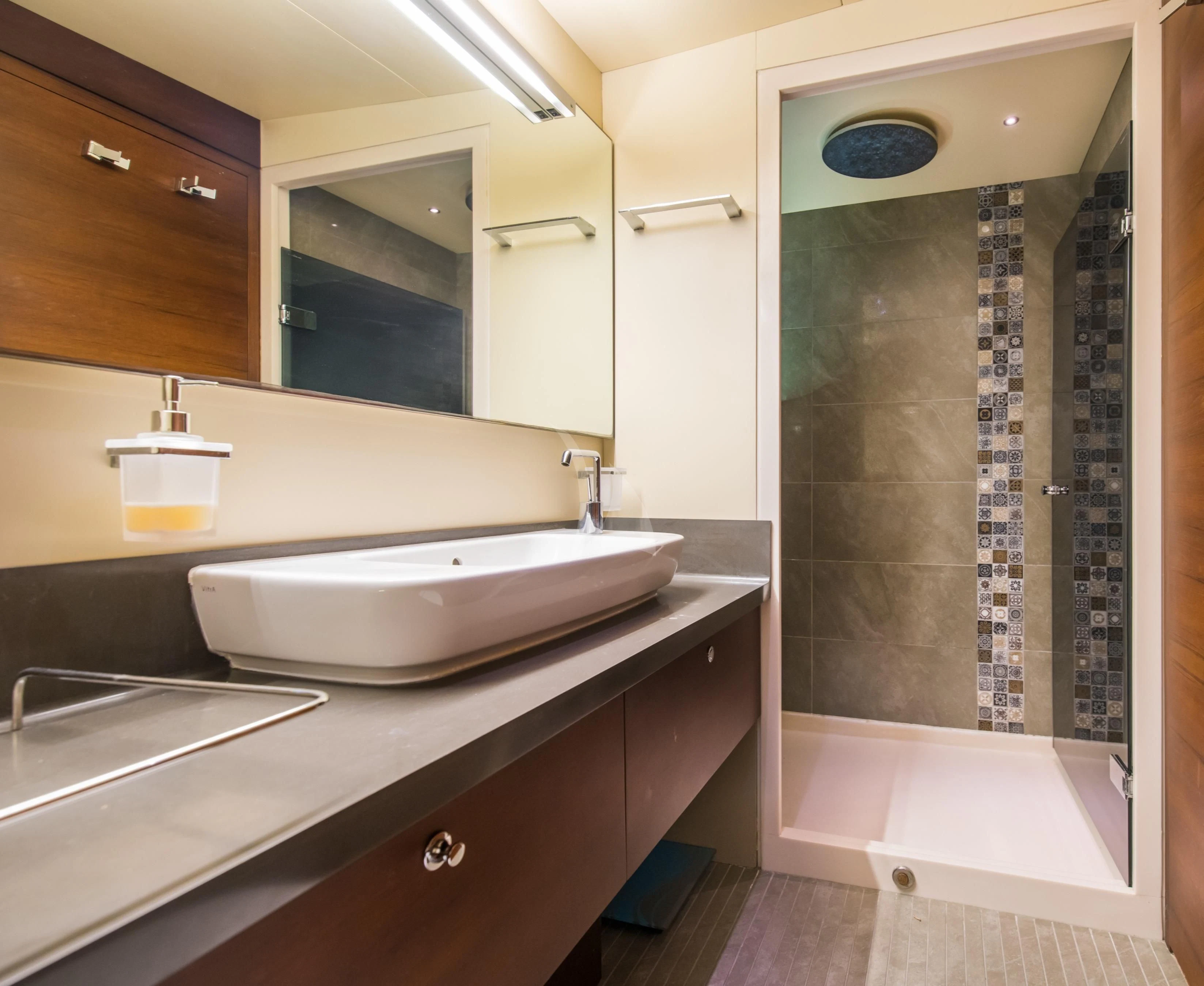 a bathroom with sinks and mirrors aboard DOUBLE EAGLE Yacht for Sale