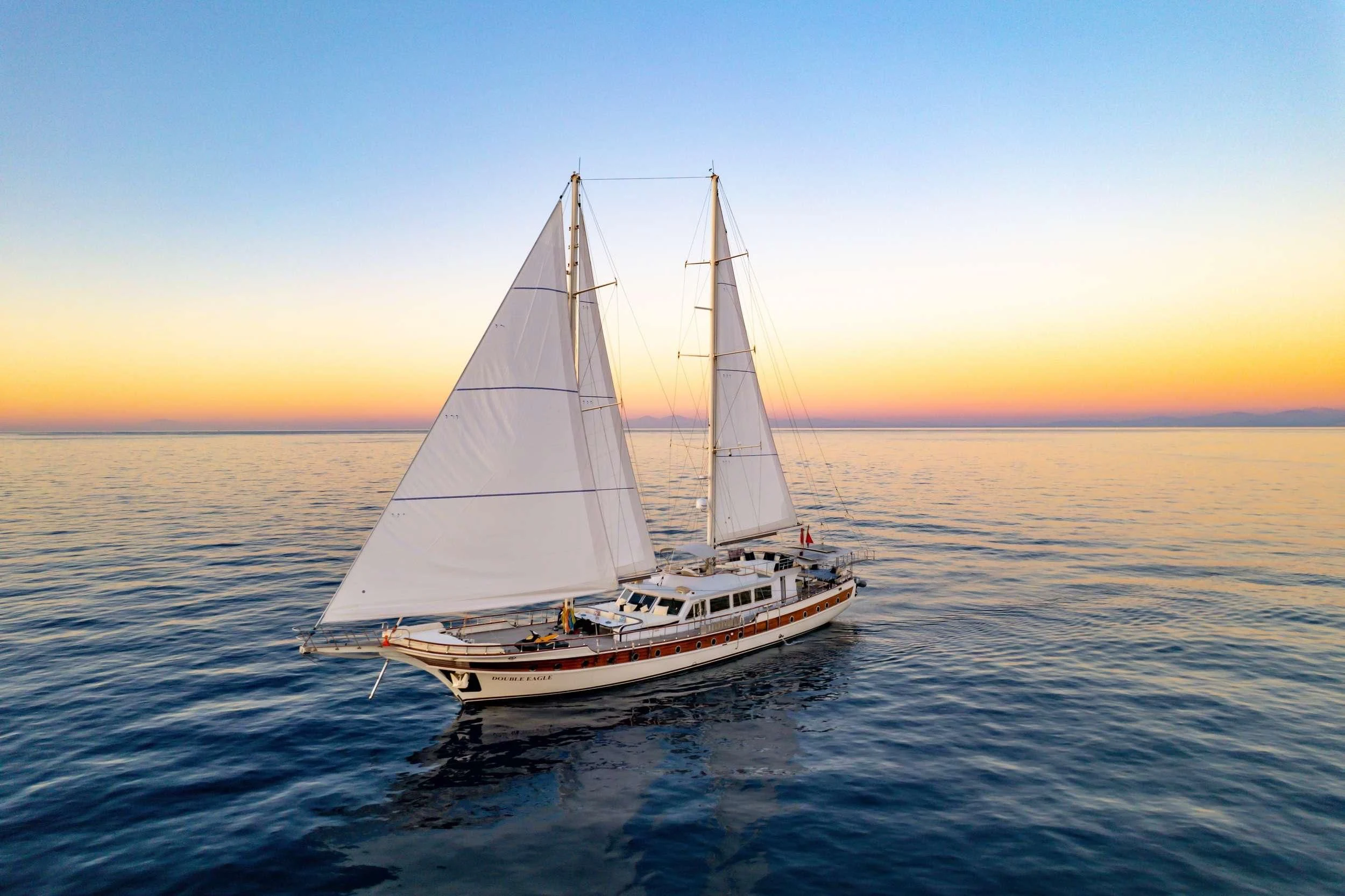 a sailboat in the water aboard DOUBLE EAGLE Yacht for Sale