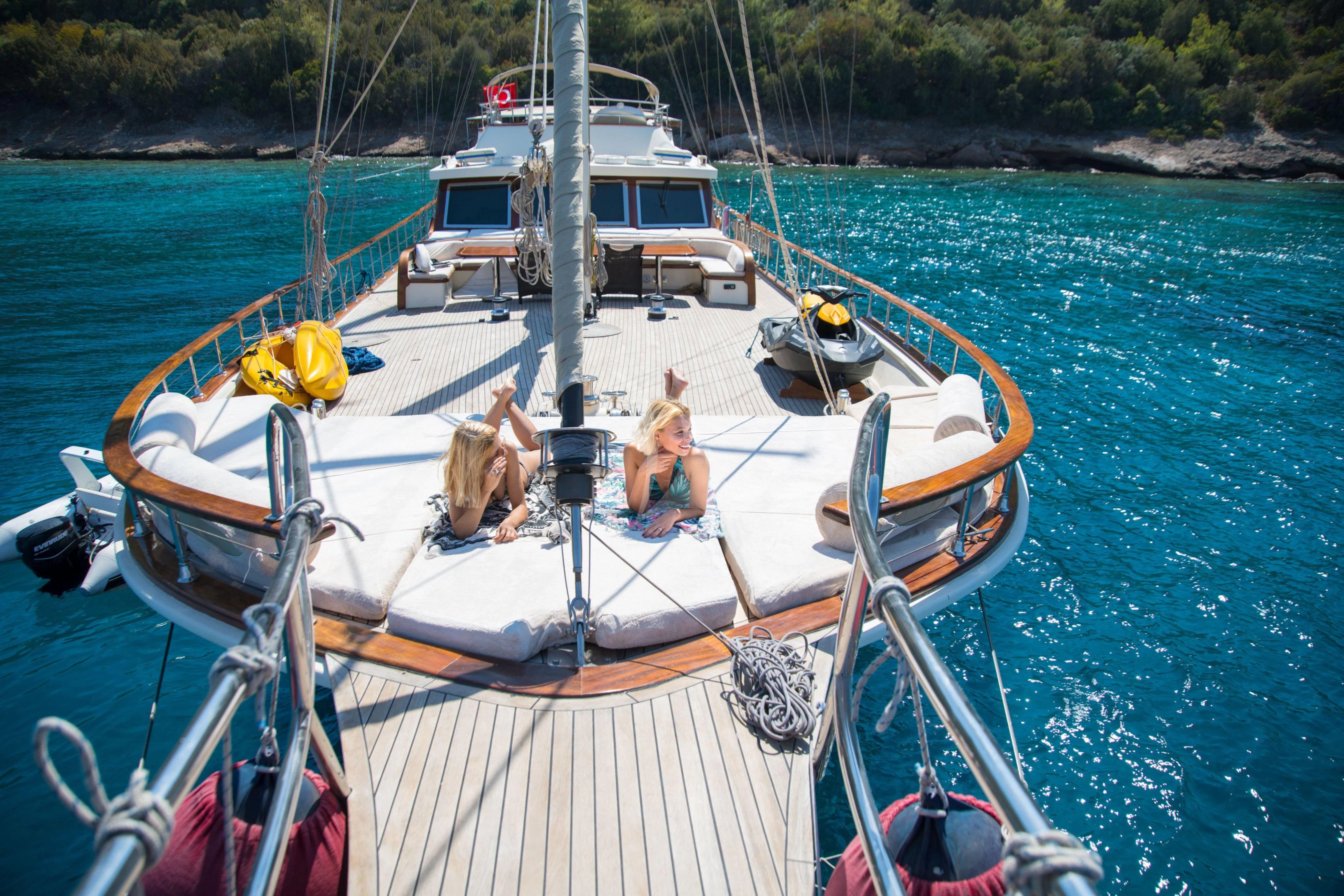 a boat with two people on it aboard DOUBLE EAGLE Yacht for Sale
