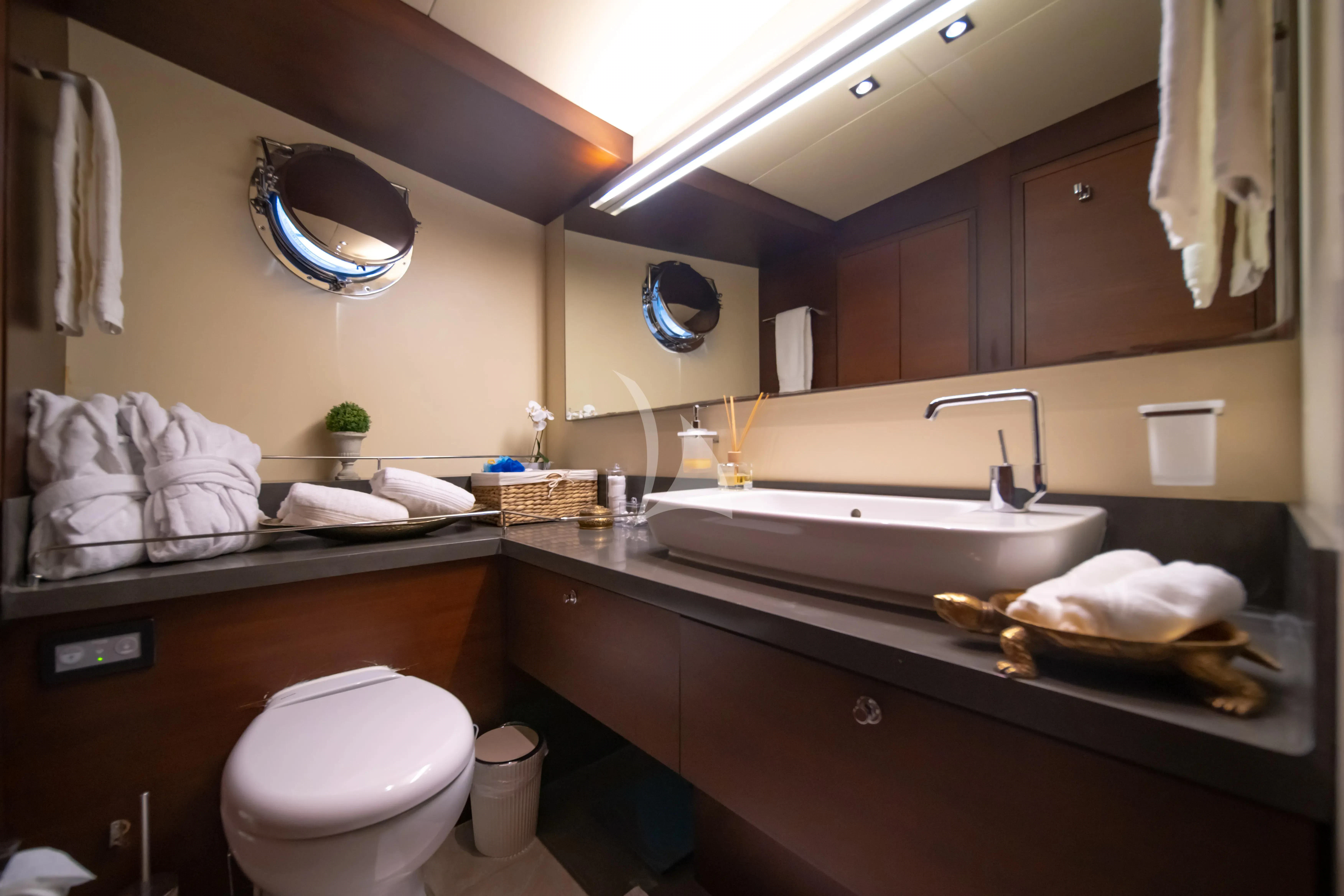 a bathroom with a large mirror aboard DOUBLE EAGLE Yacht for Sale