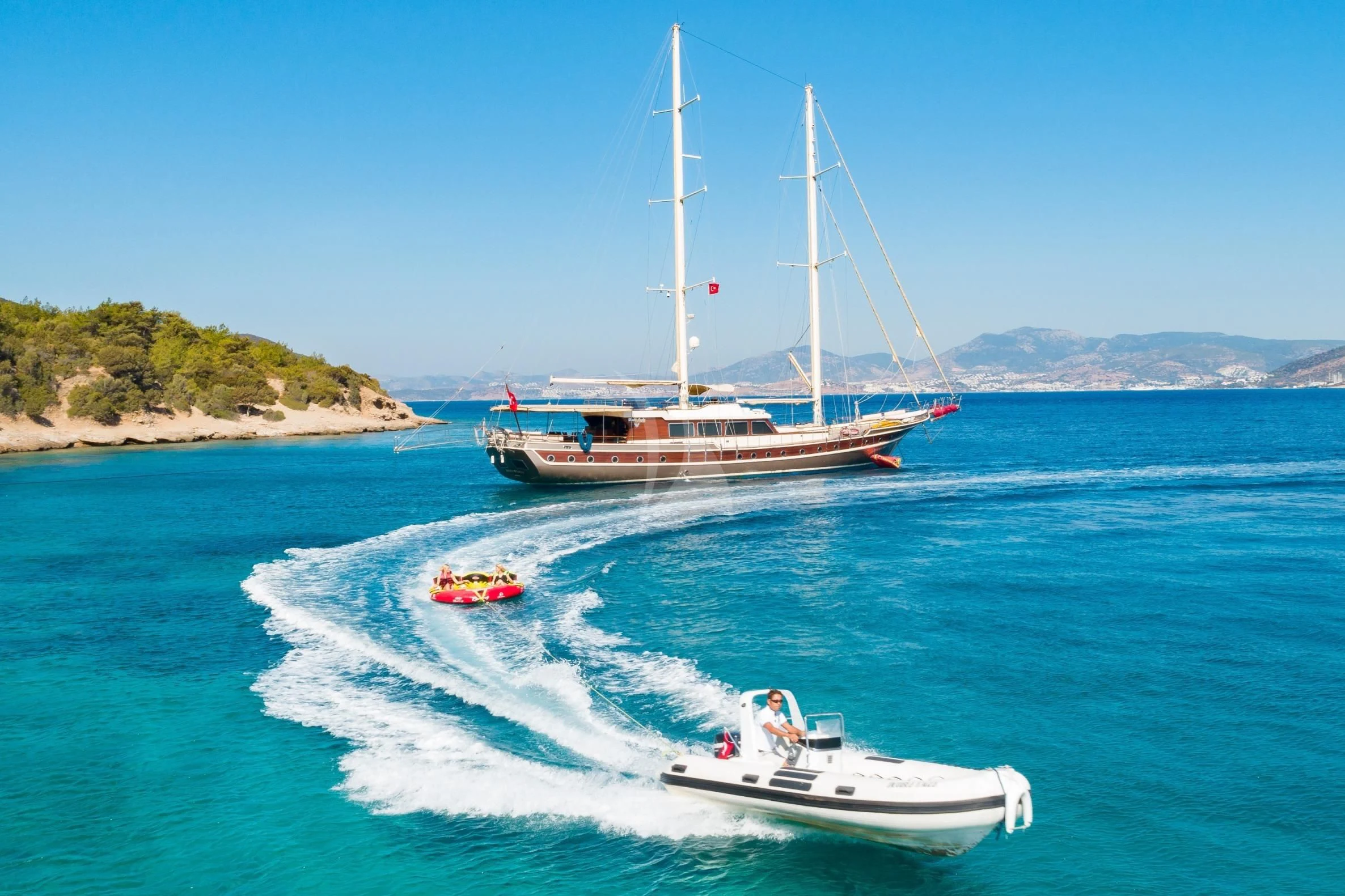 a boat and a boat on the water aboard DOUBLE EAGLE Yacht for Sale