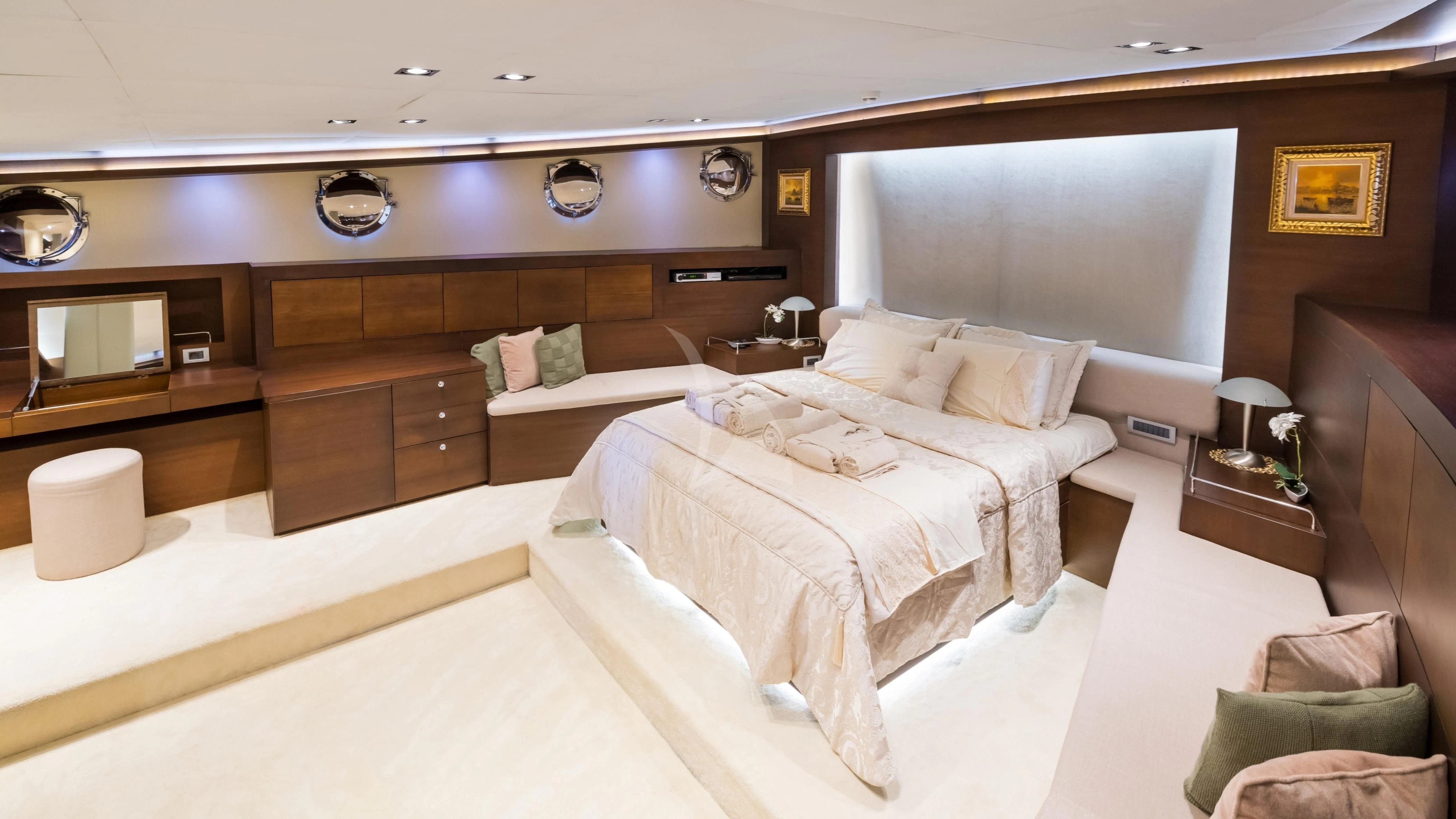 a room with a bed and a couch aboard DOUBLE EAGLE Yacht for Sale