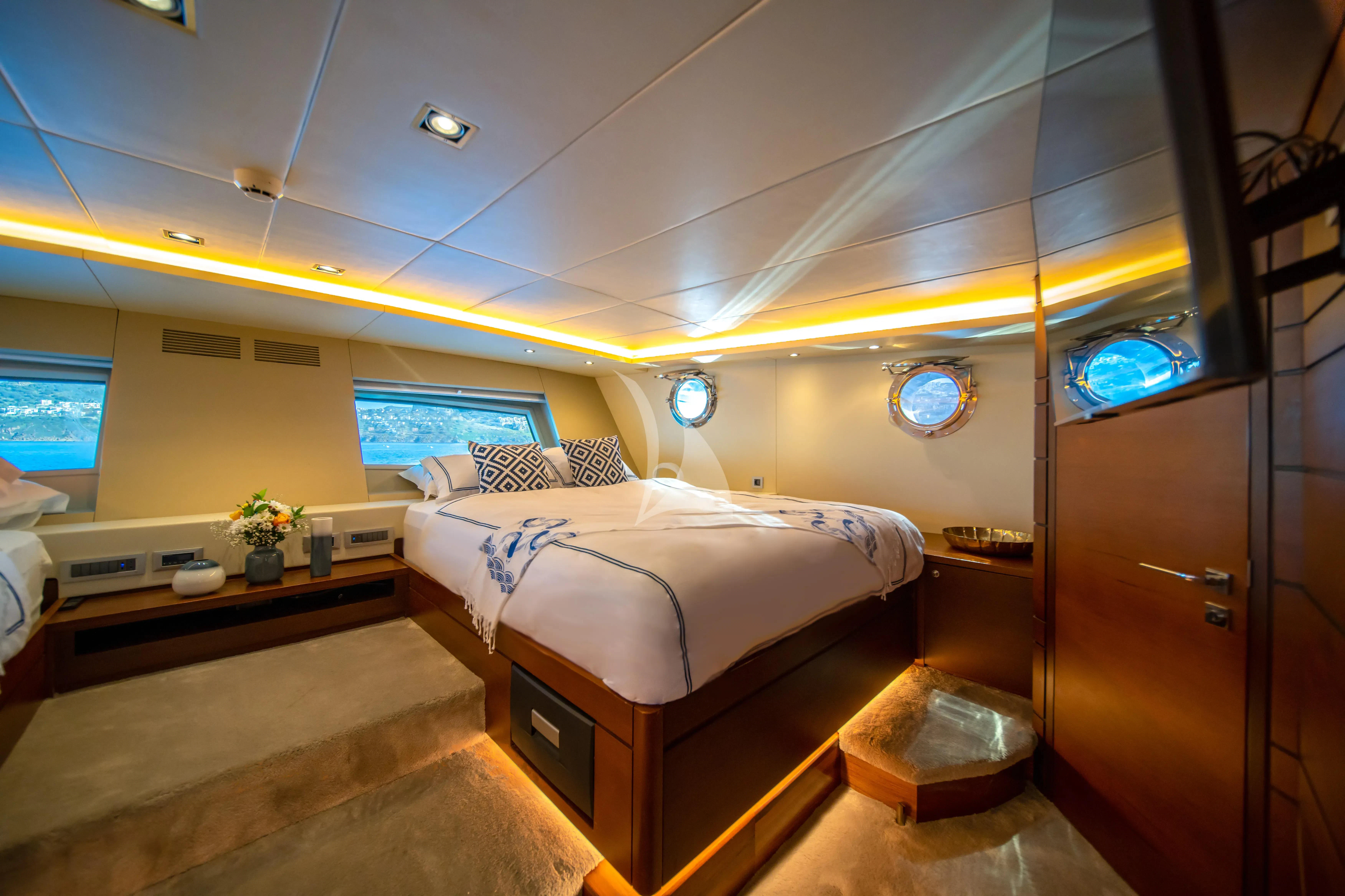 a room with a bed and a desk aboard DOUBLE EAGLE Yacht for Sale