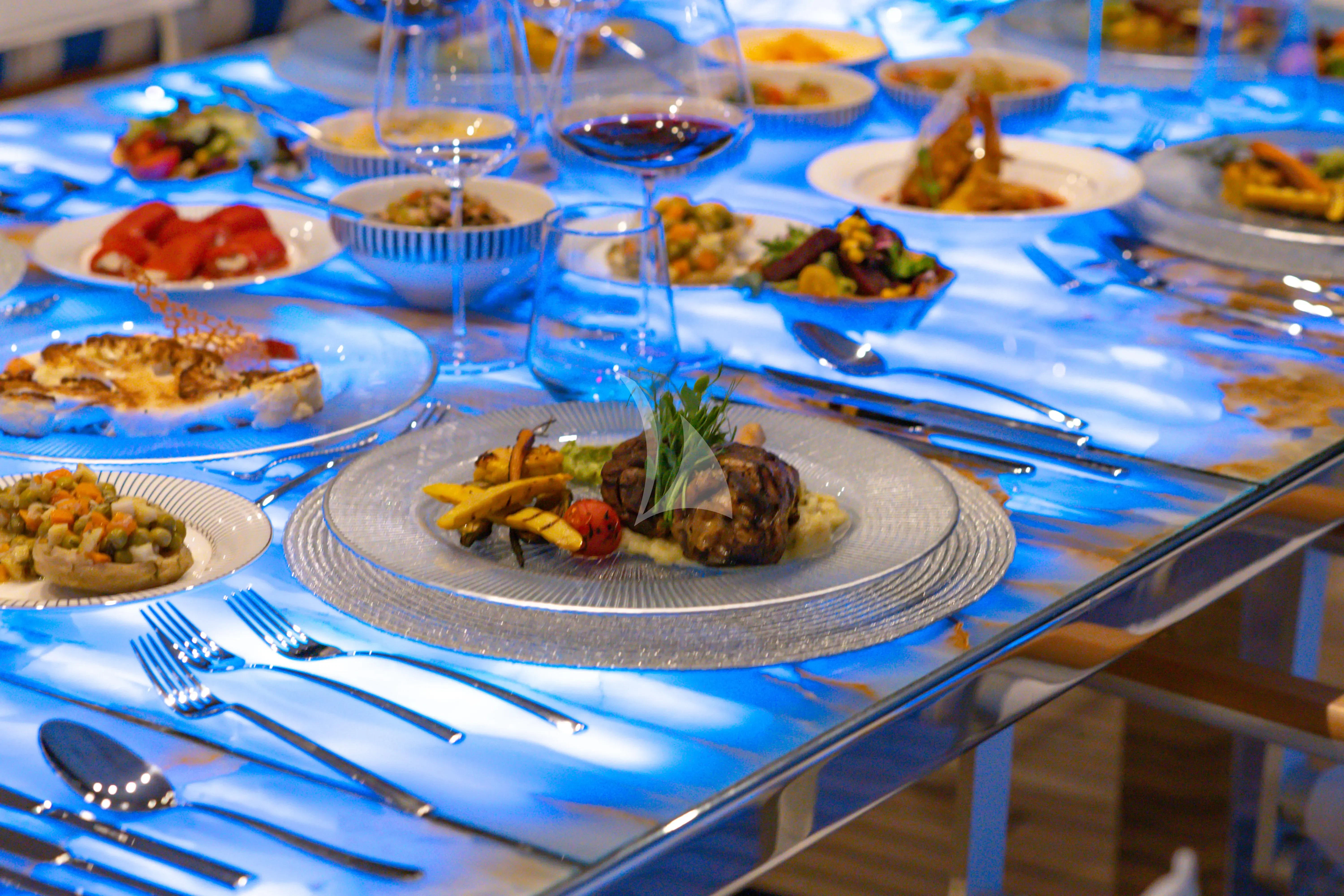 a table full of food aboard DOUBLE EAGLE Yacht for Sale