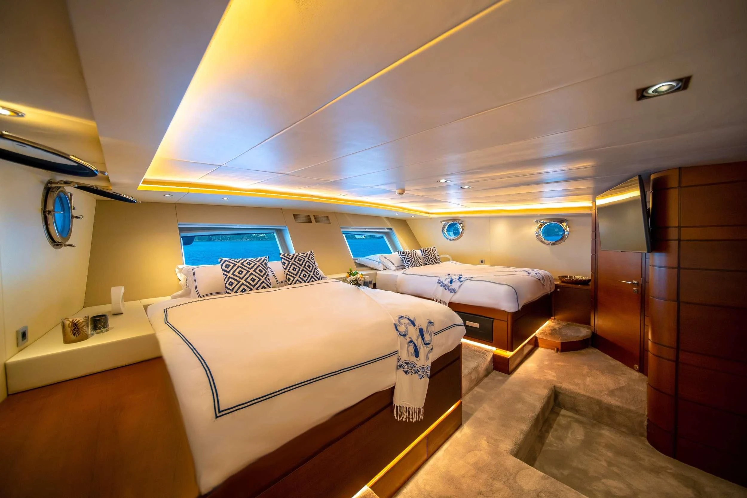 a room with beds and a computer aboard DOUBLE EAGLE Yacht for Sale