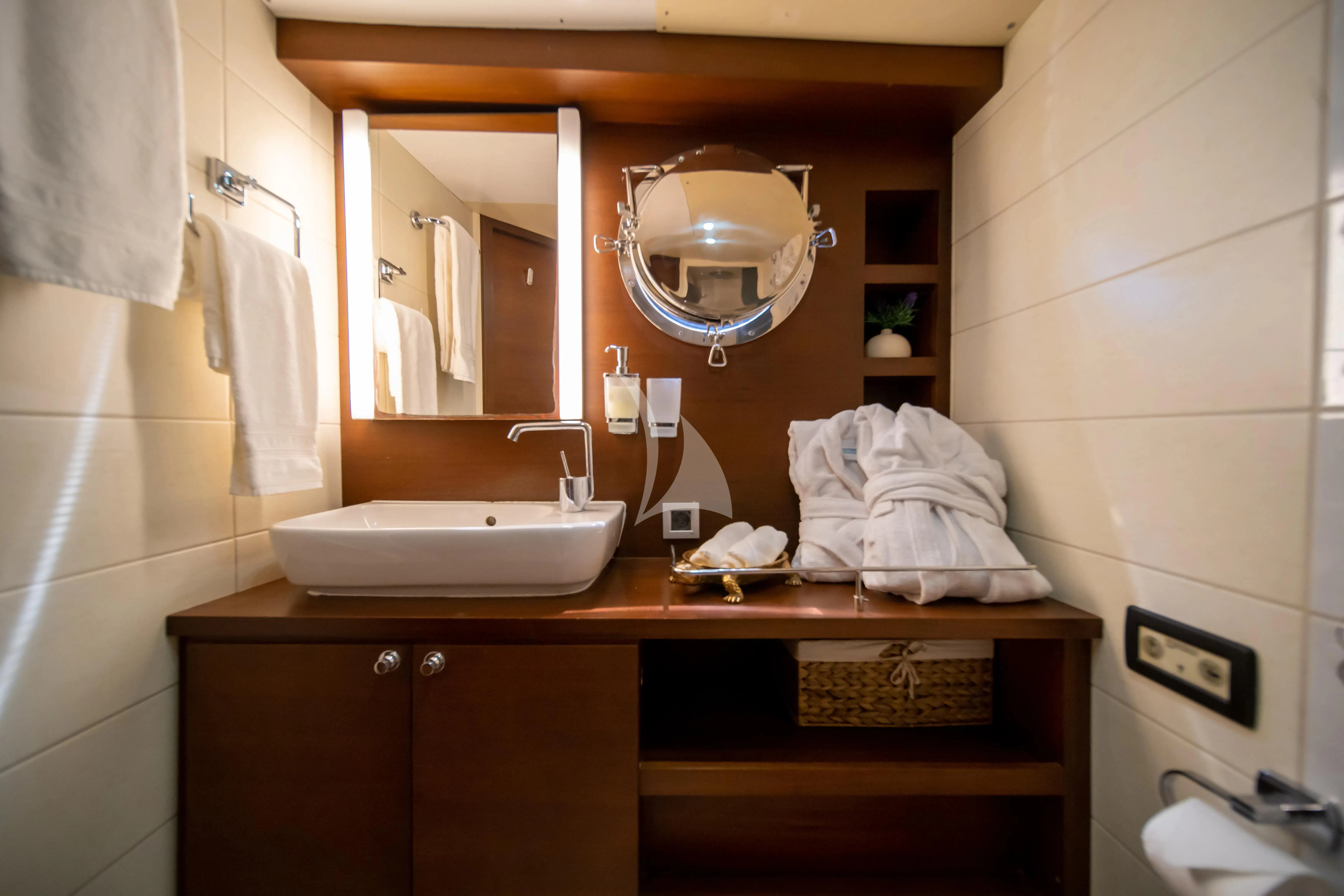 a bathroom with a mirror and a sink aboard DOUBLE EAGLE Yacht for Sale