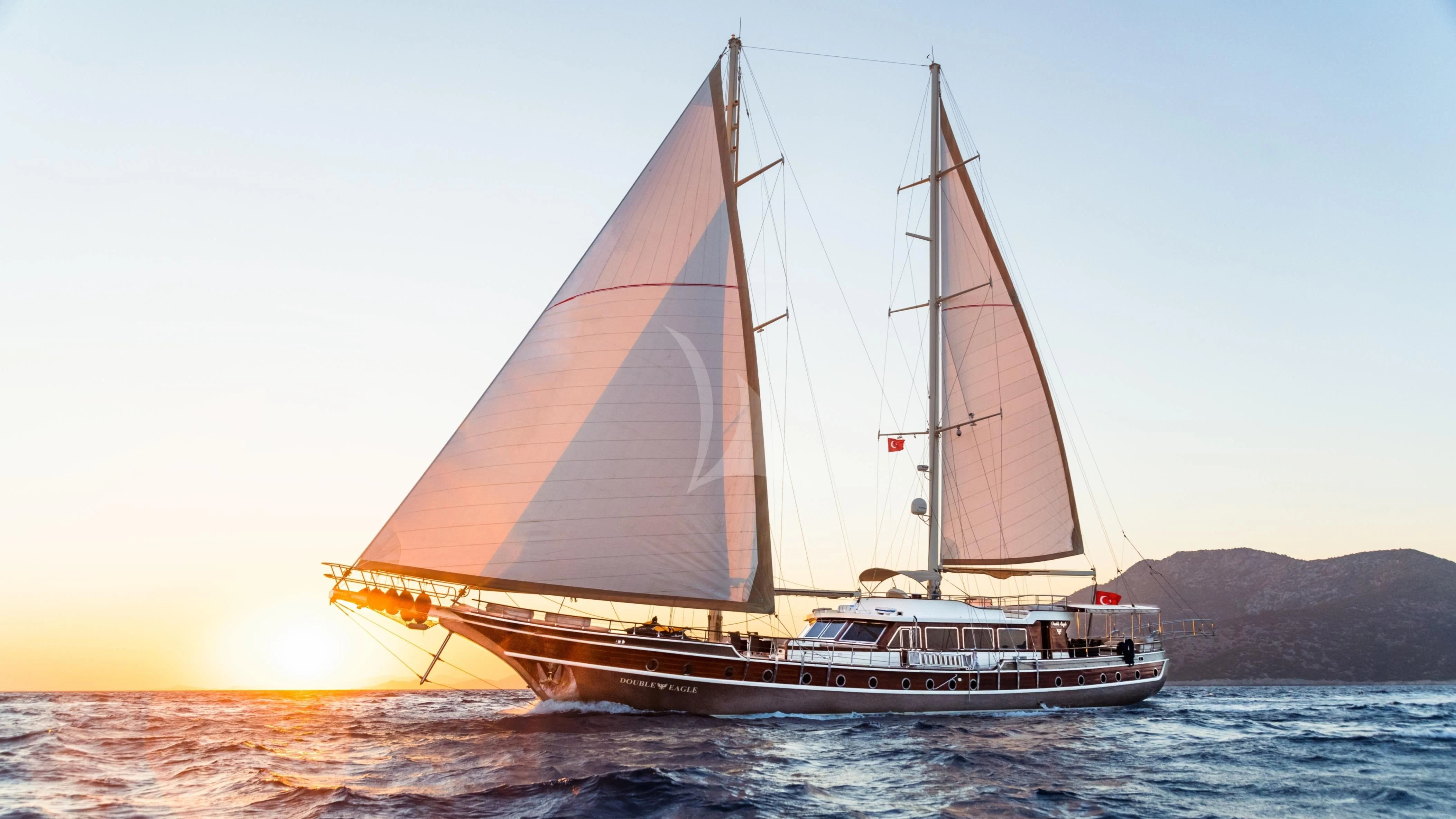 a sailboat on the water aboard DOUBLE EAGLE Yacht for Sale