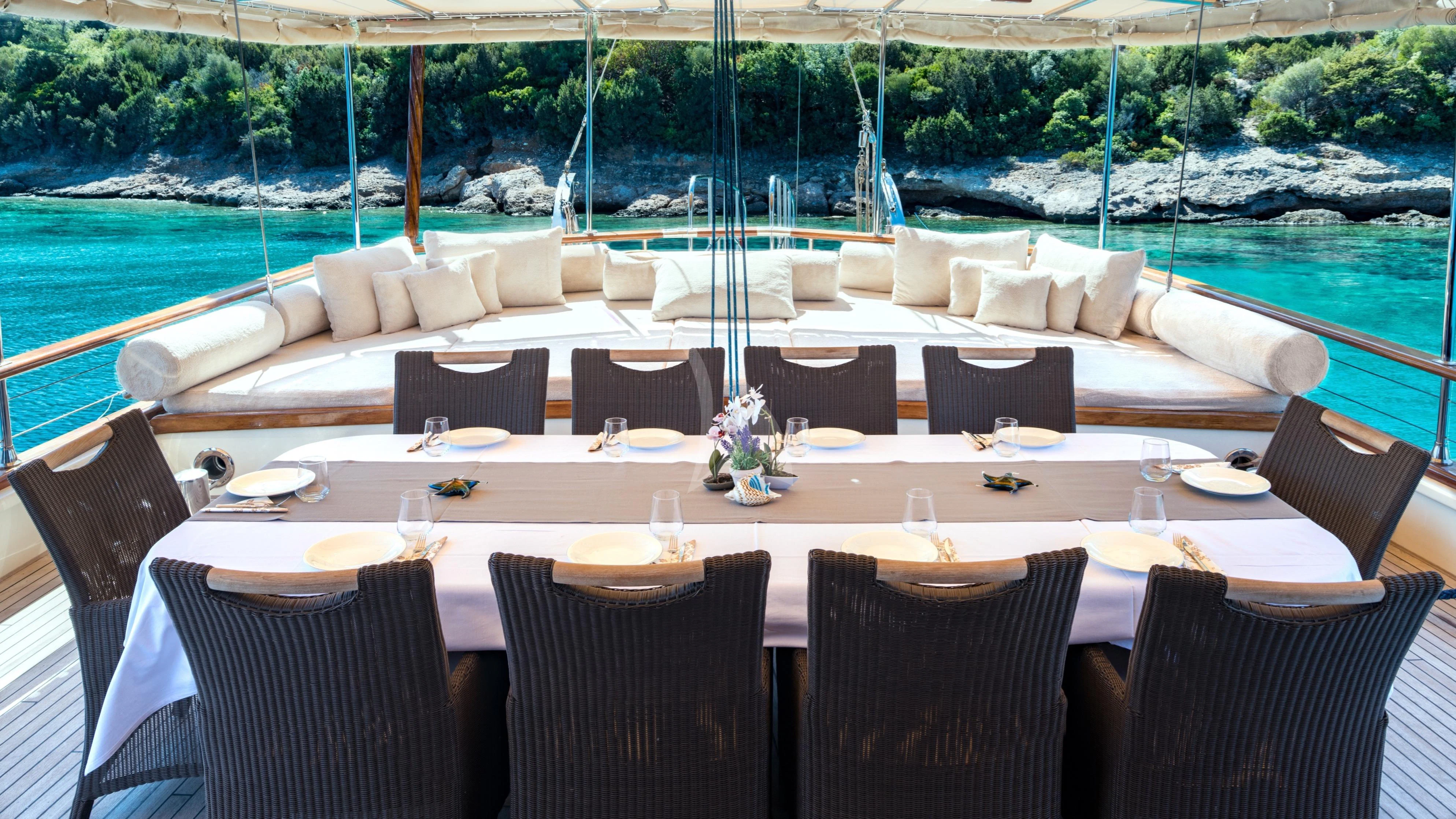 a table set for a dinner aboard DOUBLE EAGLE Yacht for Sale