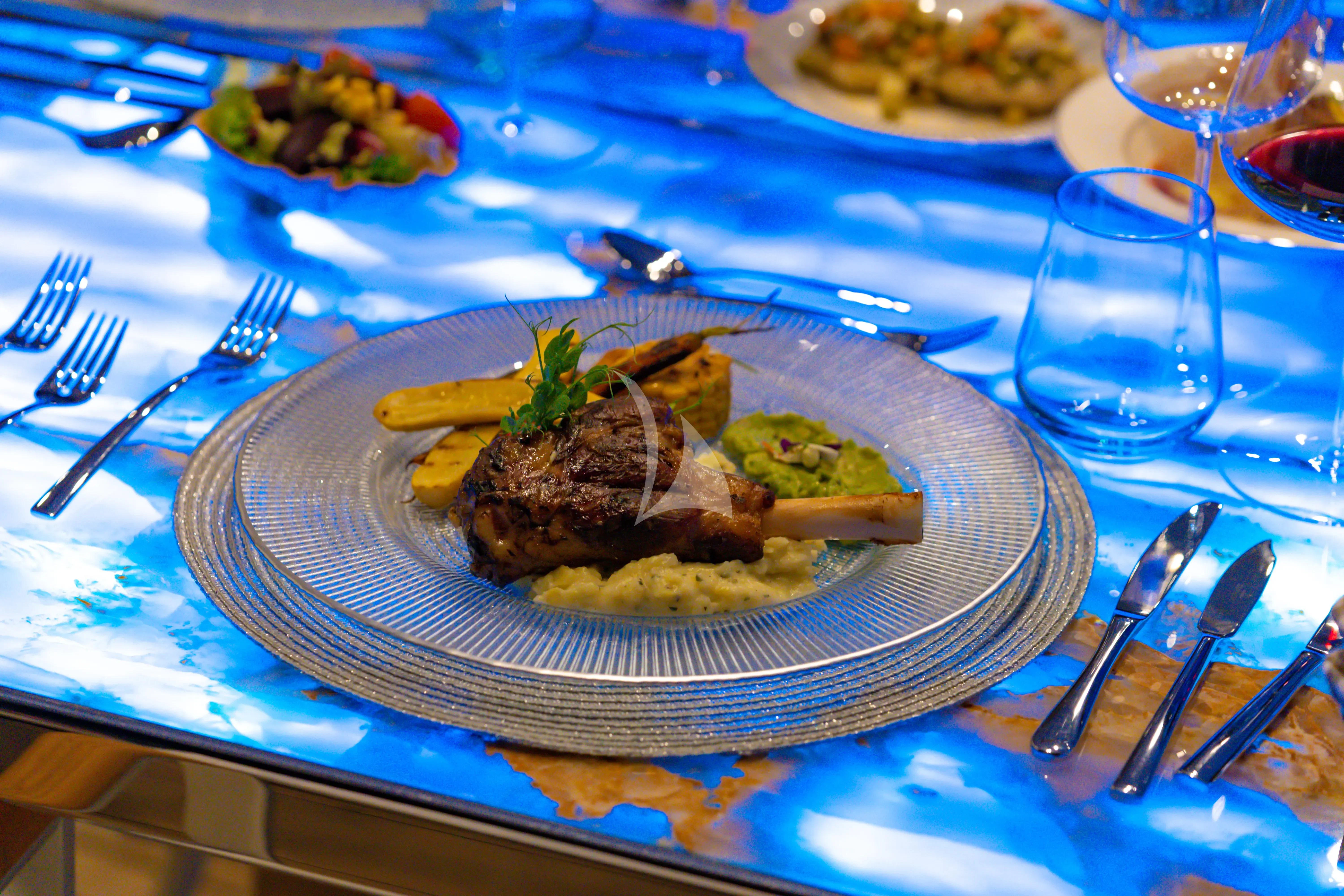 a plate of food aboard DOUBLE EAGLE Yacht for Sale