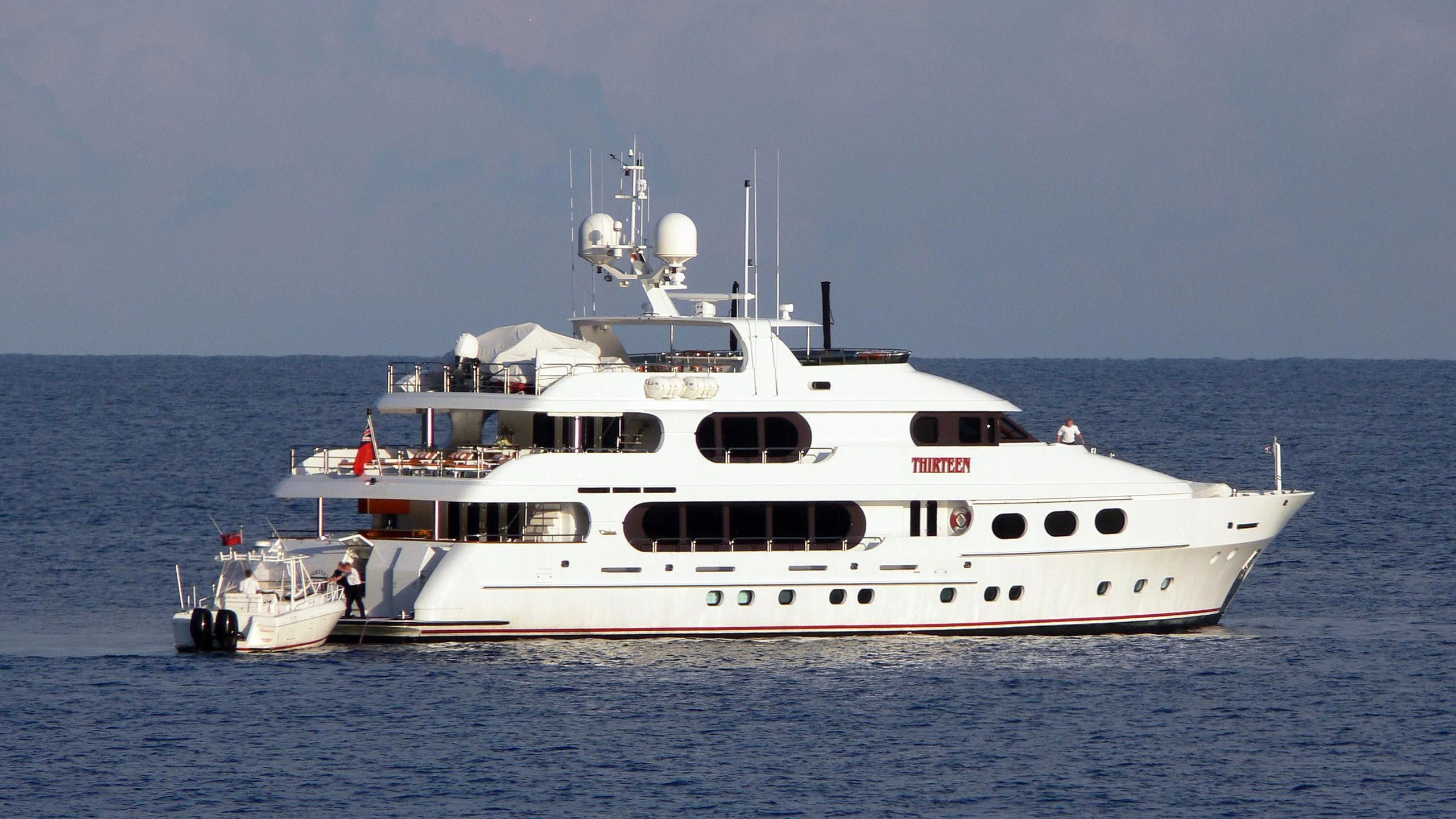 a large white boat in the water aboard CRILI Yacht for Sale