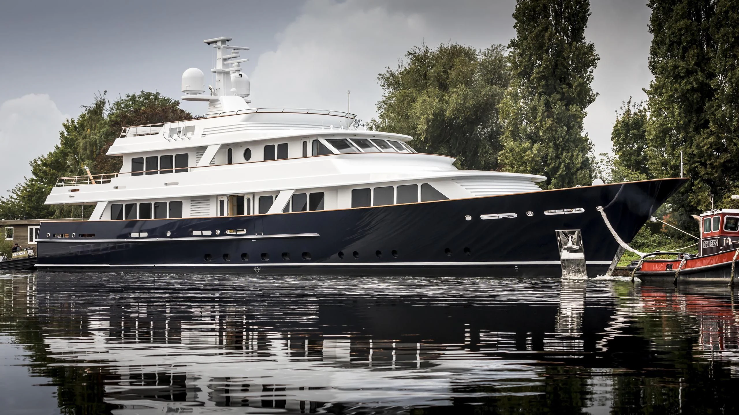 a large boat on the water aboard VALORIA B Yacht for Sale