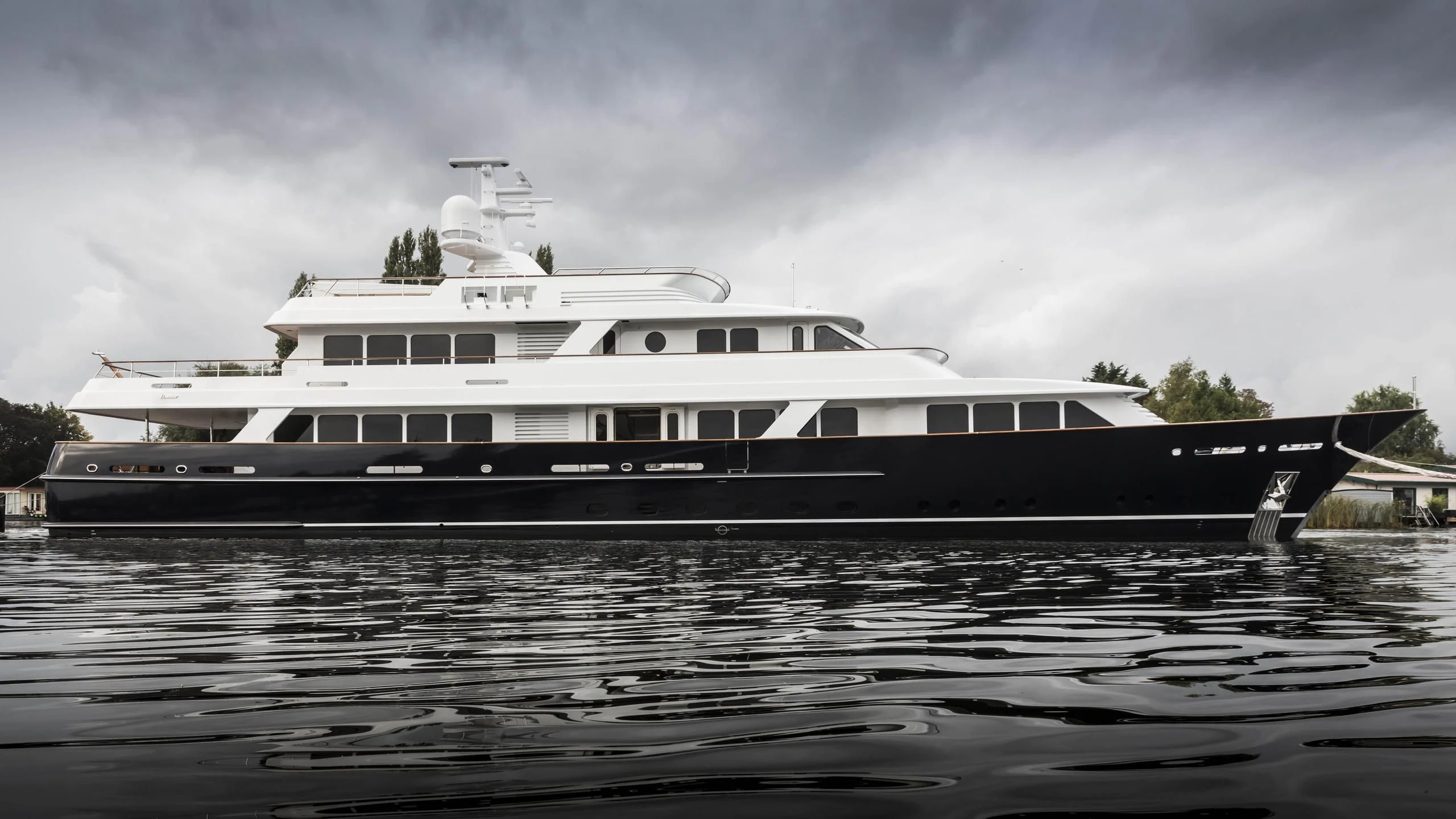 a large boat on the water aboard VALORIA B Yacht for Sale