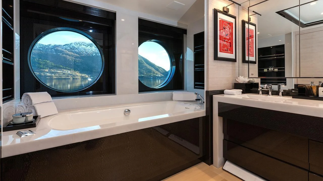 a bathroom with a large jacuzzi tub aboard EVENT Yacht for Sale