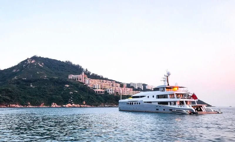a couple of boats on the water aboard EVENT Yacht for Sale