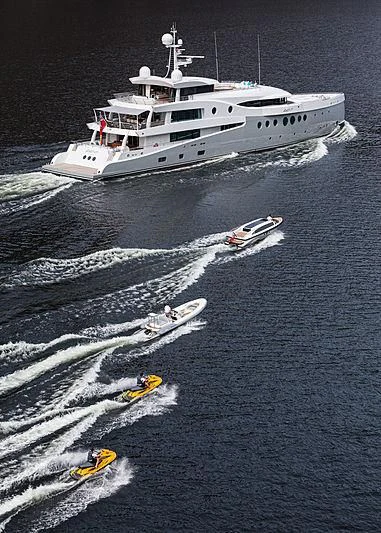 a boat and a helicopter in the water aboard EVENT Yacht for Sale