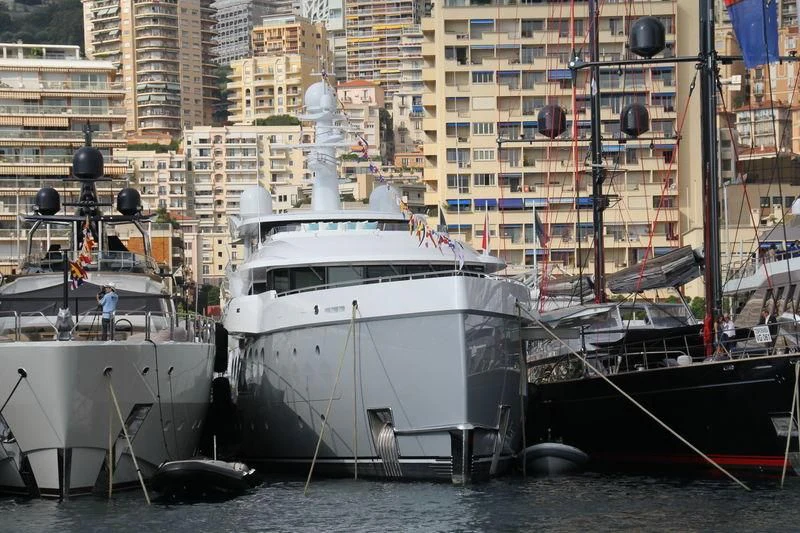 a couple of boats are parked in a harbor aboard EVENT Yacht for Sale