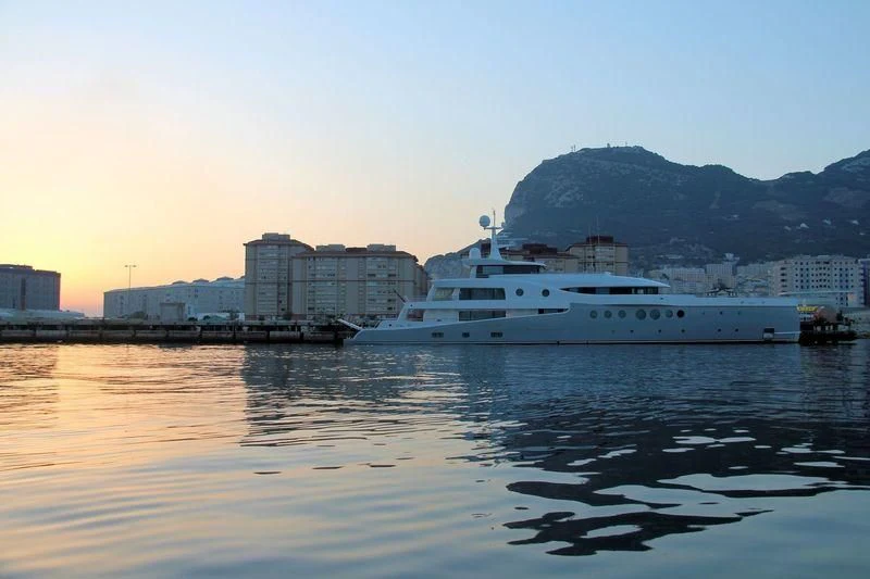 a large white boat on a body of water aboard EVENT Yacht for Sale