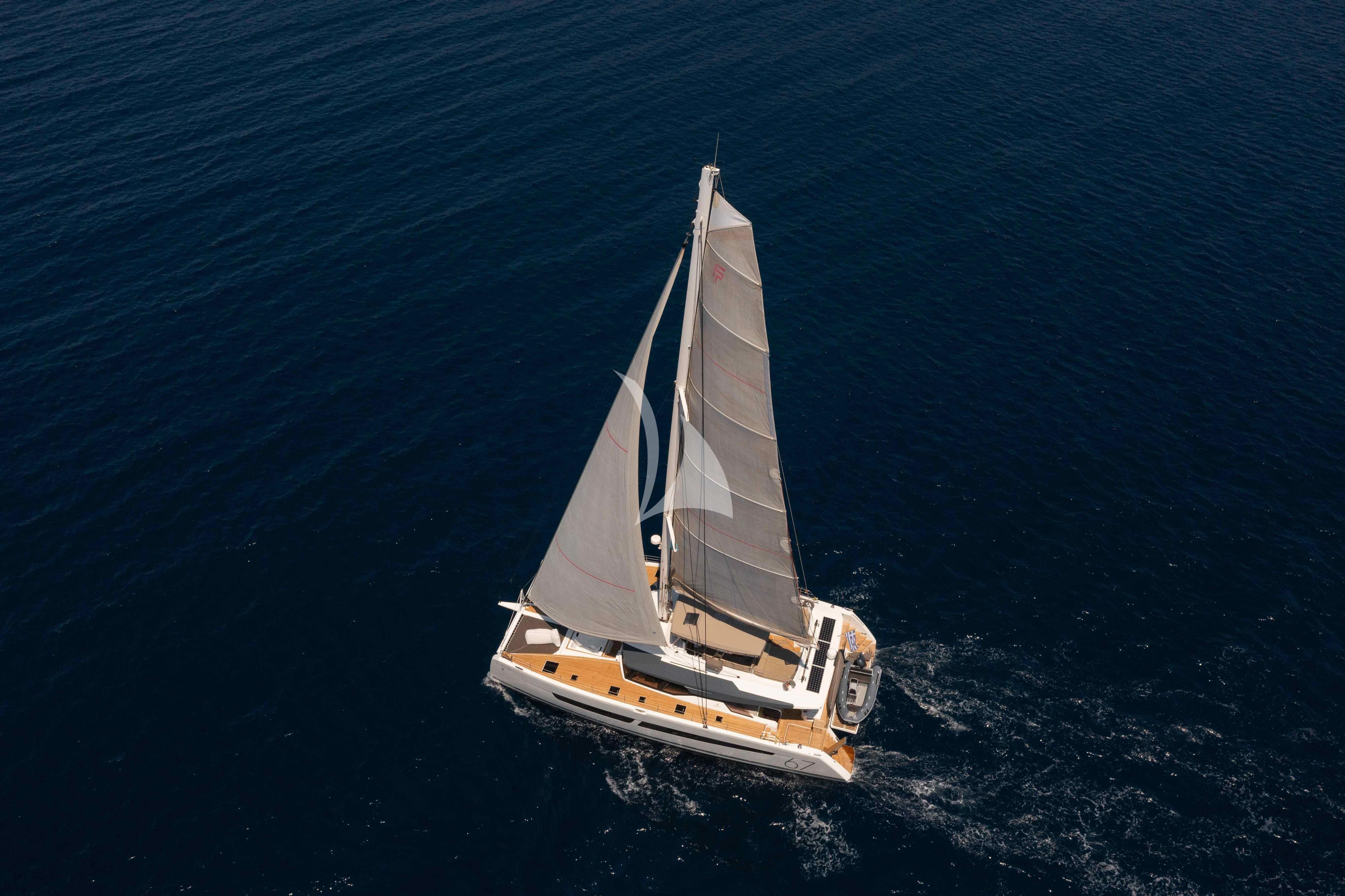 a sailboat in the water aboard AETHER Yacht for Charter