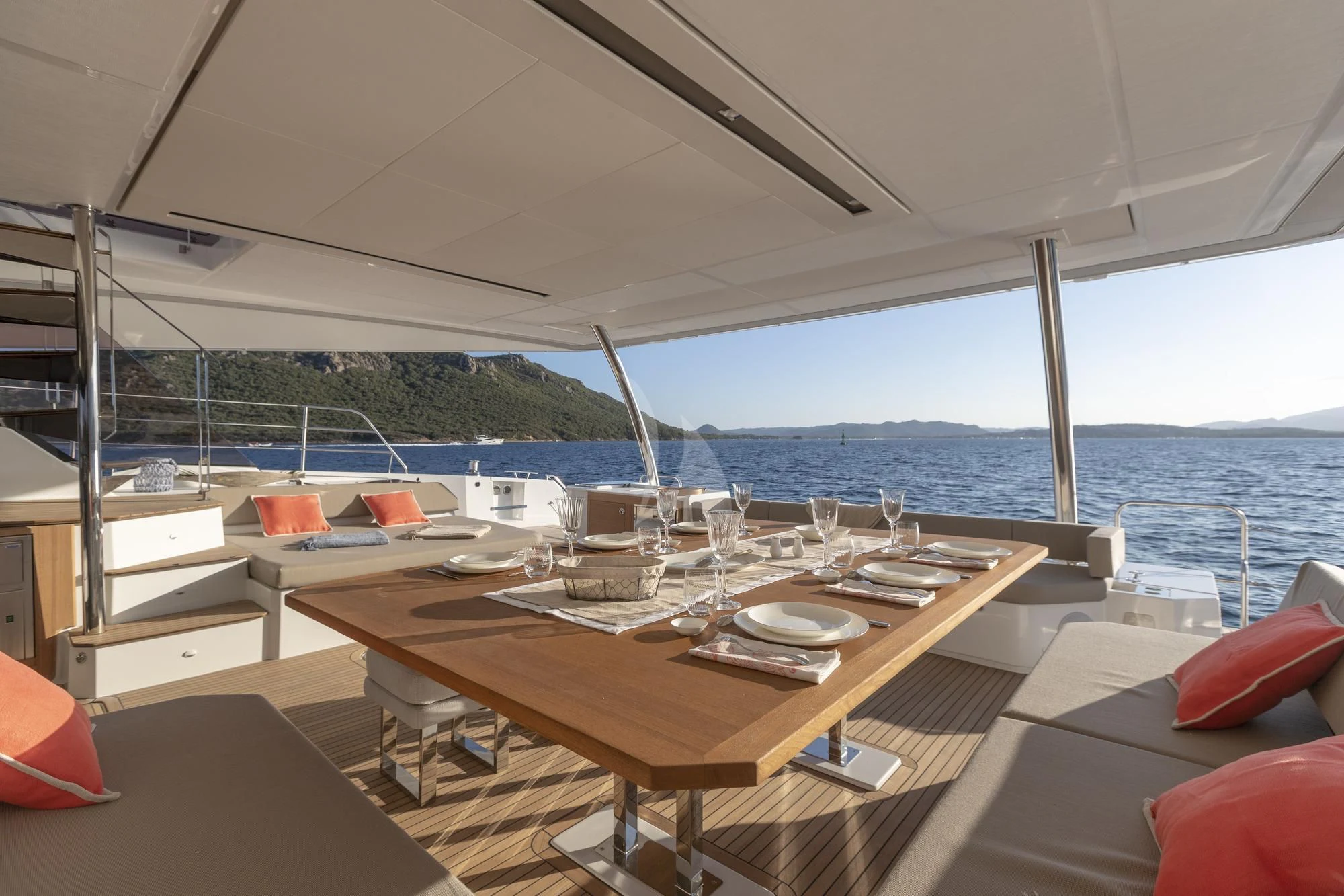 a table on a boat aboard AETHER Yacht for Charter
